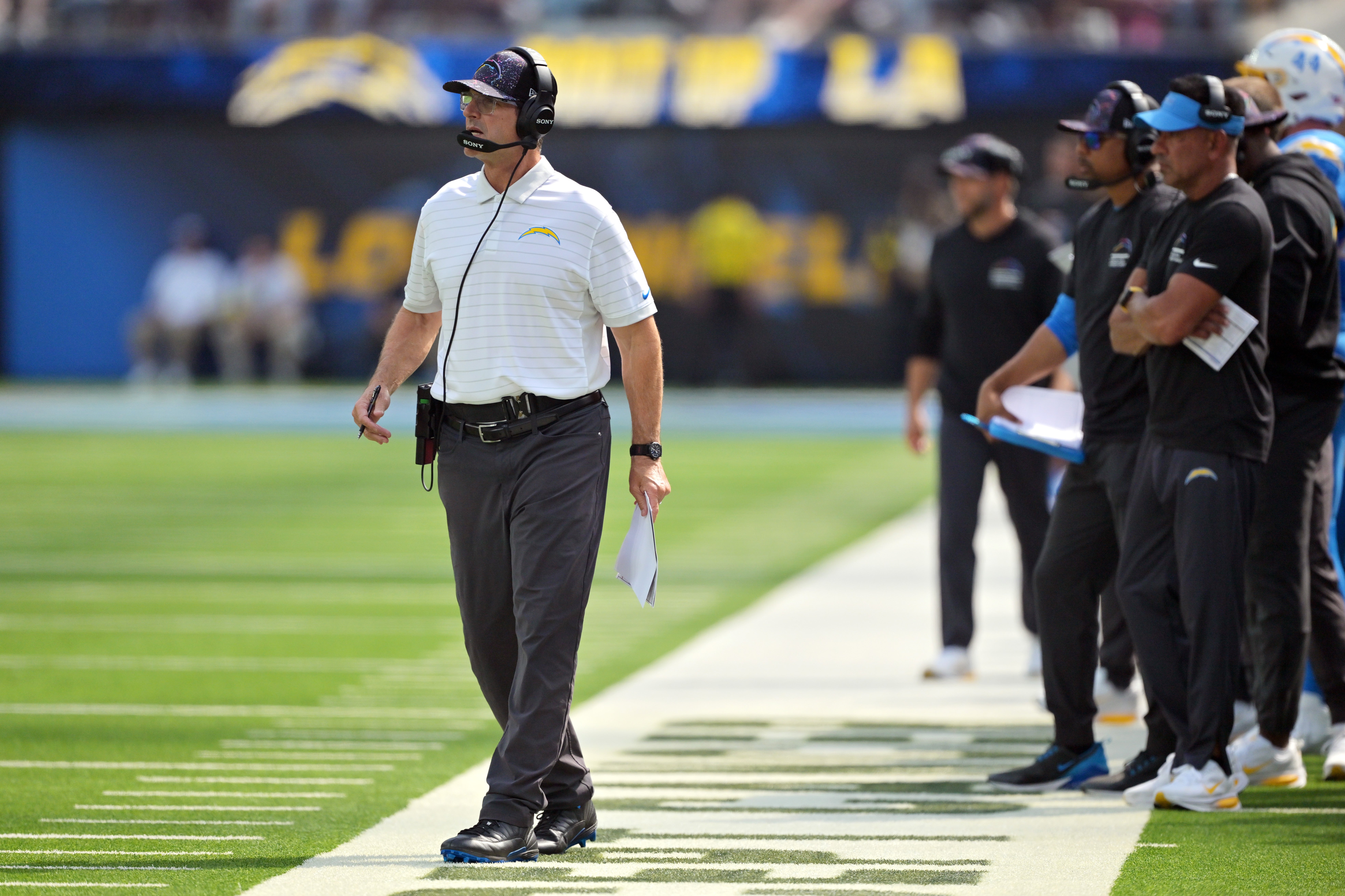 Oct 5, 2025; Inglewood, California, USA; Los Angeles Chargers head coach Jim Harbaugh looks on in the first half against the Washington Commanders at SoFi Stadium. Mandatory Credit: Jayne Kamin-Oncea-Imagn Images