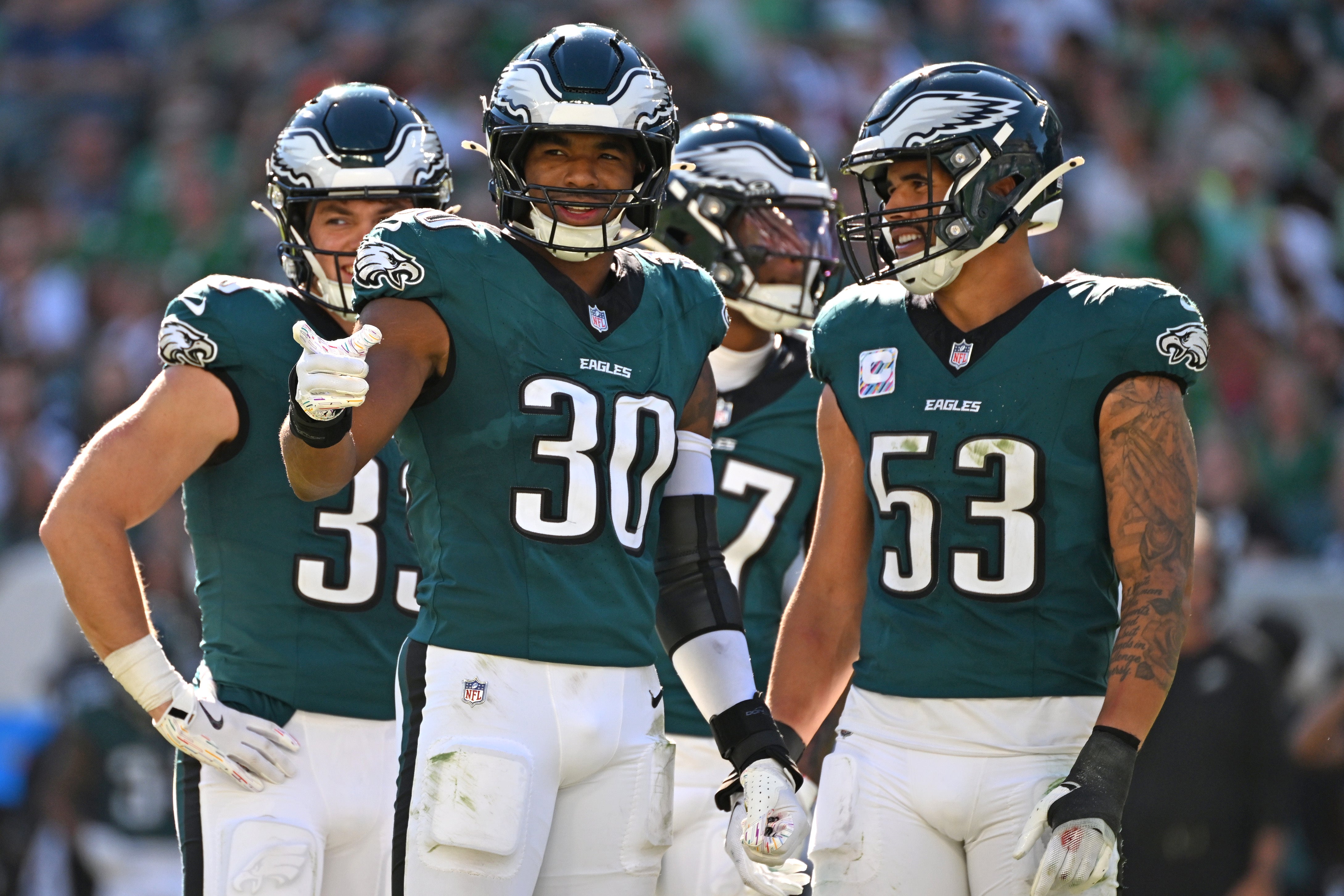 Philadelphia Eagles linebacker Jihaad Campbell (30) and linebacker Zack Baun (53) against the Denver Broncos at Lincoln Financial Field.