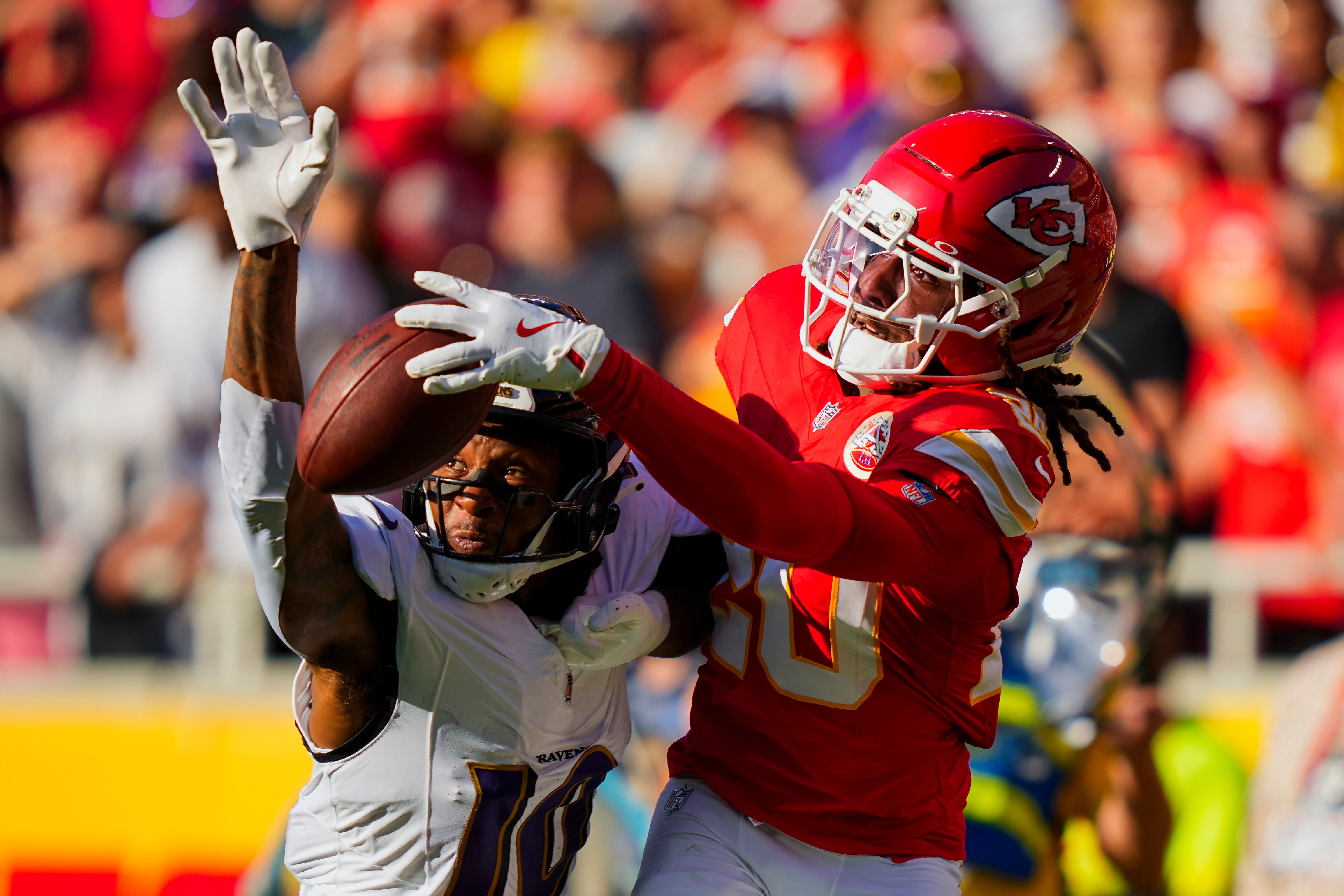 Kansas City Chiefs cornerback Nohl Williams (20) breaks up a pass intended for Baltimore Ravens wide receiver Deandre Hopkins (10)