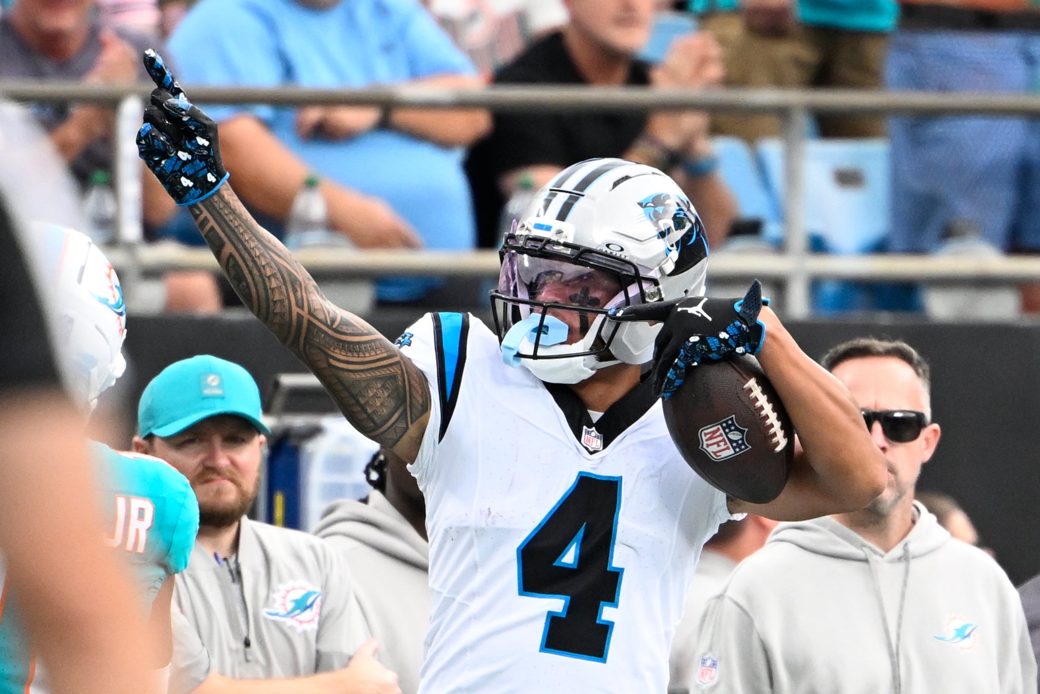 Oct 5, 2025; Charlotte, North Carolina, USA; Carolina Panthers wide receiver Tetairoa McMillan (4) signals first down in the second quarter at Bank of America Stadium.