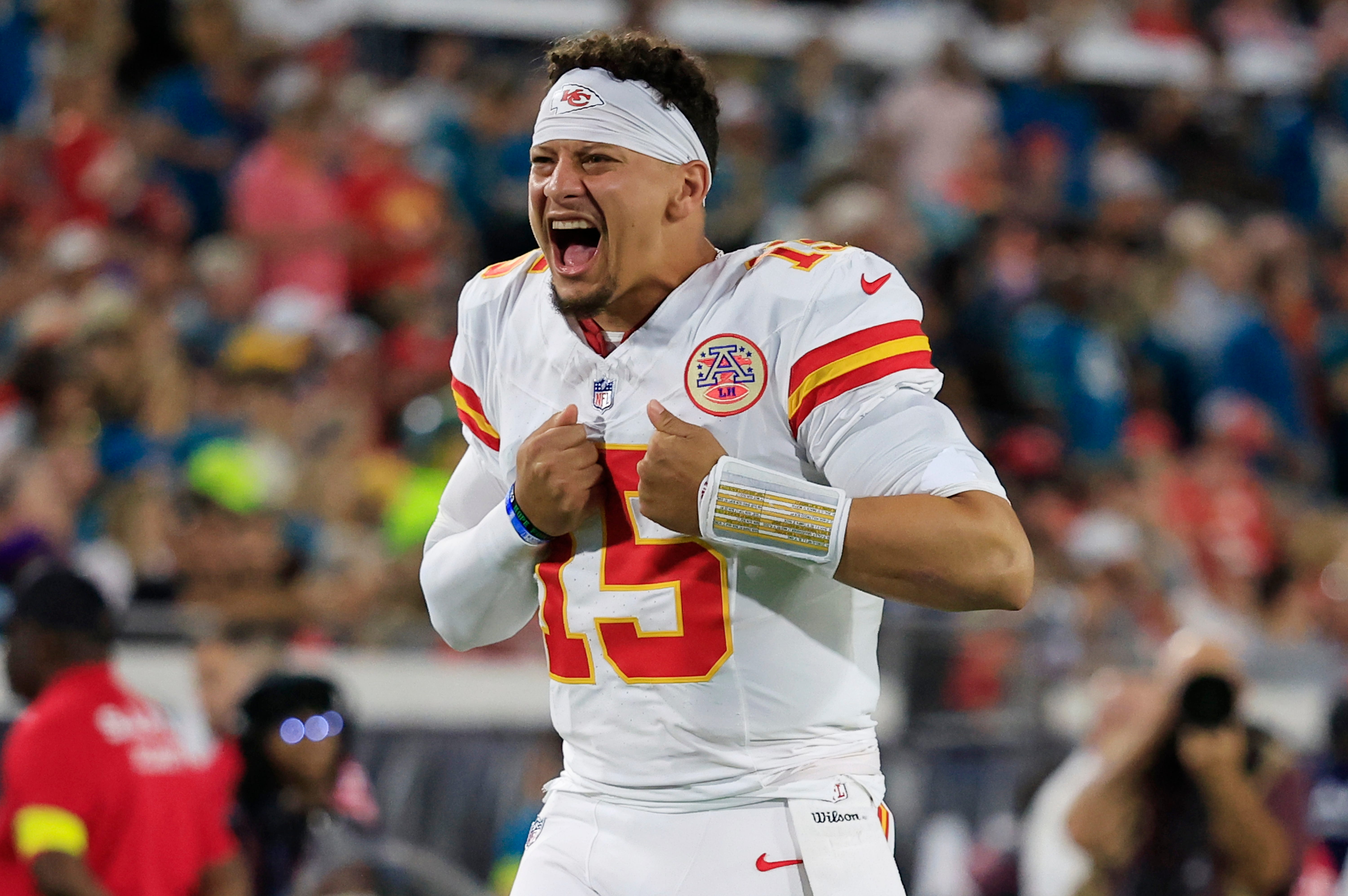 Kansas City Chiefs quarterback Patrick Mahomes (15) gets the crowd hyped