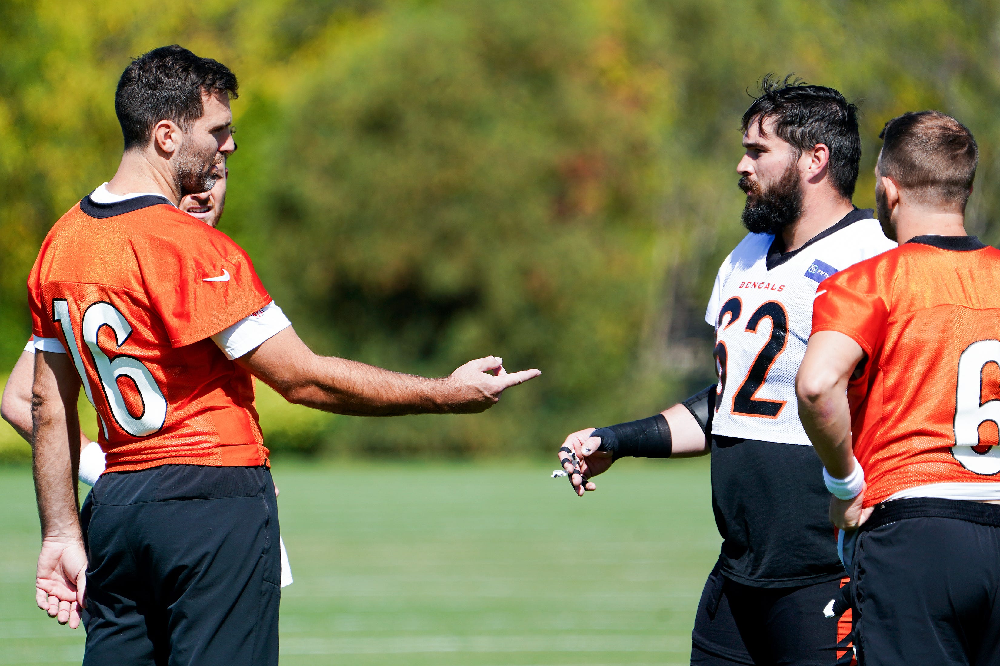 Cincinnati Bengals quarterback Joe Flacco (16) speaks with teammates during practice, Wednesday, Oct. 8, 2025, at the Kettering Health Bengals Practice Fields in downtown Cincinnati.