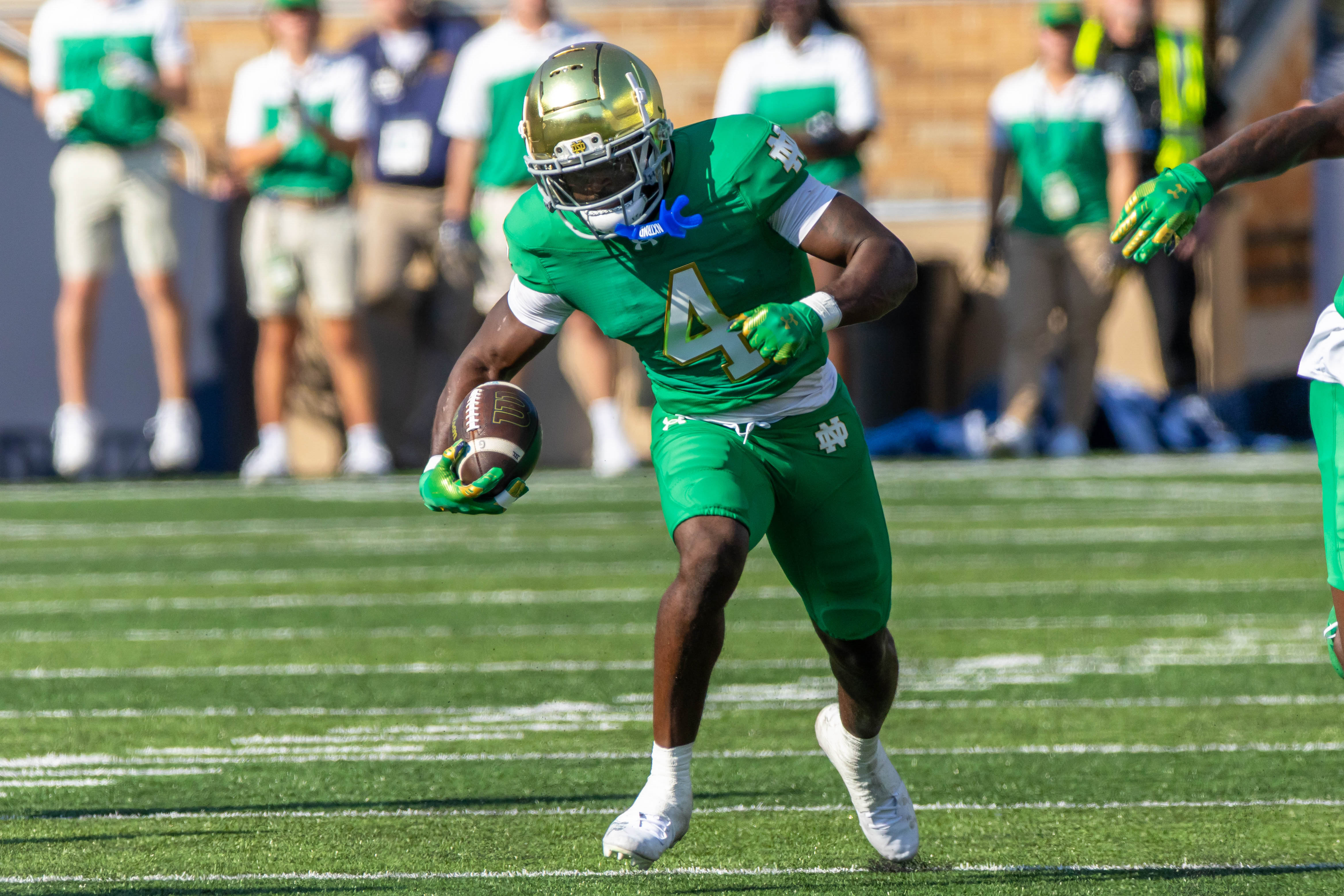Oct 4, 2025; South Bend, Indiana, USA; Notre Dame Fighting Irish running back Jeremiyah Love (4) runs the ball against the Boise State Broncos at Notre Dame Stadium. Mandatory Credit: Michael Caterina-Imagn Images