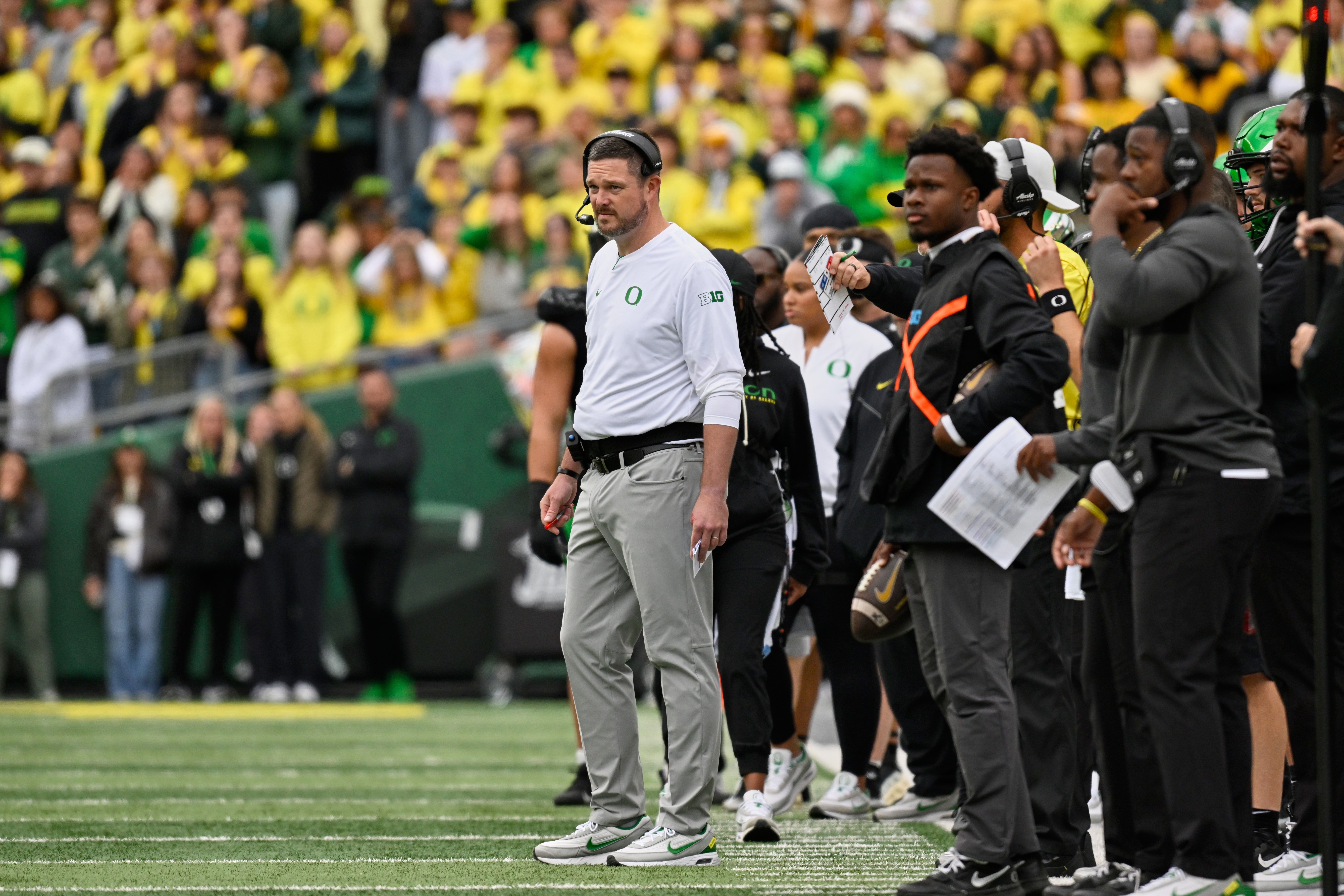 Oct 11, 2025; Eugene, Oregon, USA; Oregon Ducks head coach Dan Lanning watches game play against the Indiana Hoosiers during the second quarter at Autzen Stadium. Mandatory Credit: Troy Wayrynen-Imagn Images