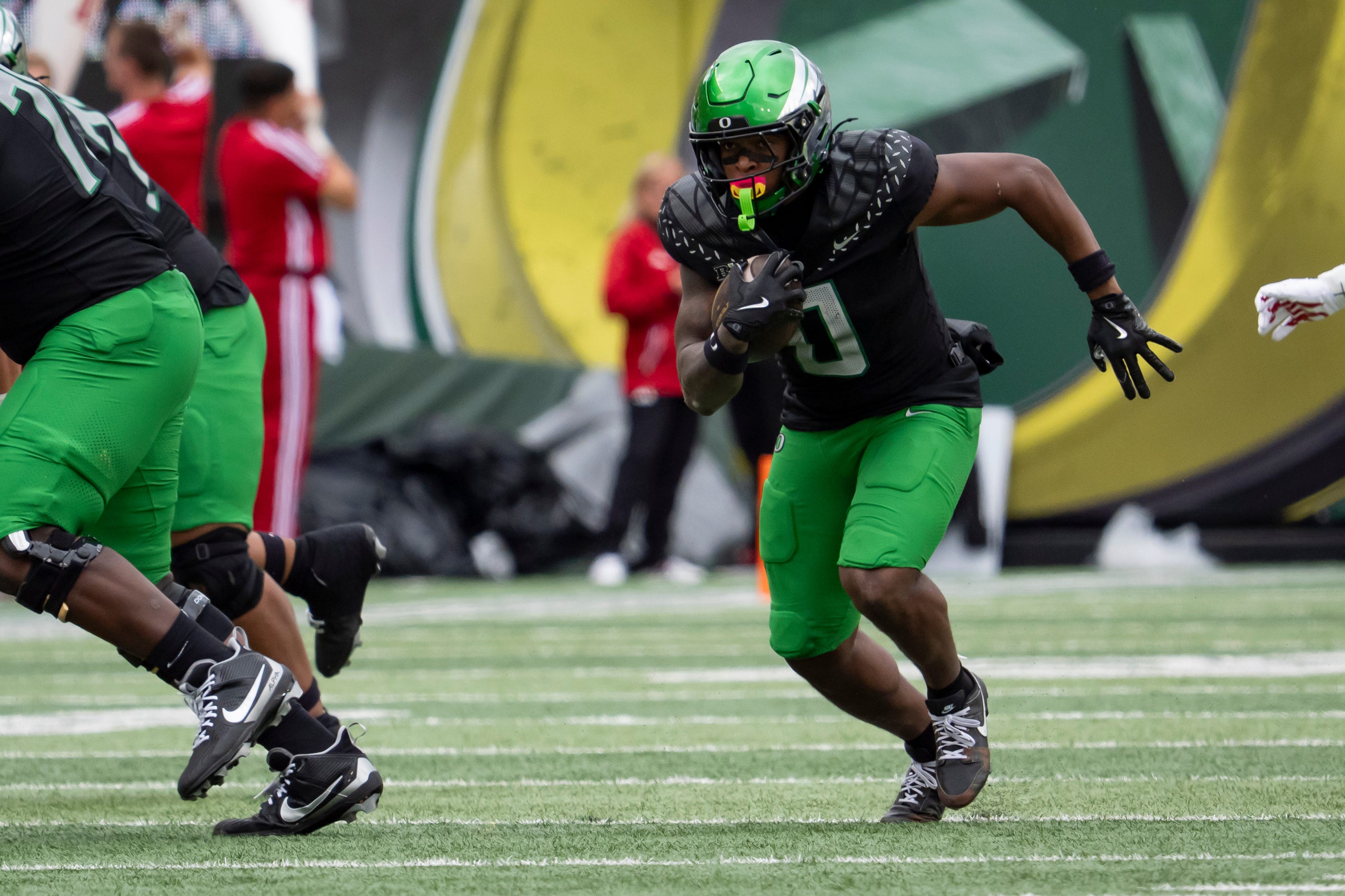 Oregon running back Jordon Davison carries the ball as the Oregon Ducks host the Indiana Hoosiers Oct. 11, 2025, at Autzen Stadium in Eugene, Oregon.