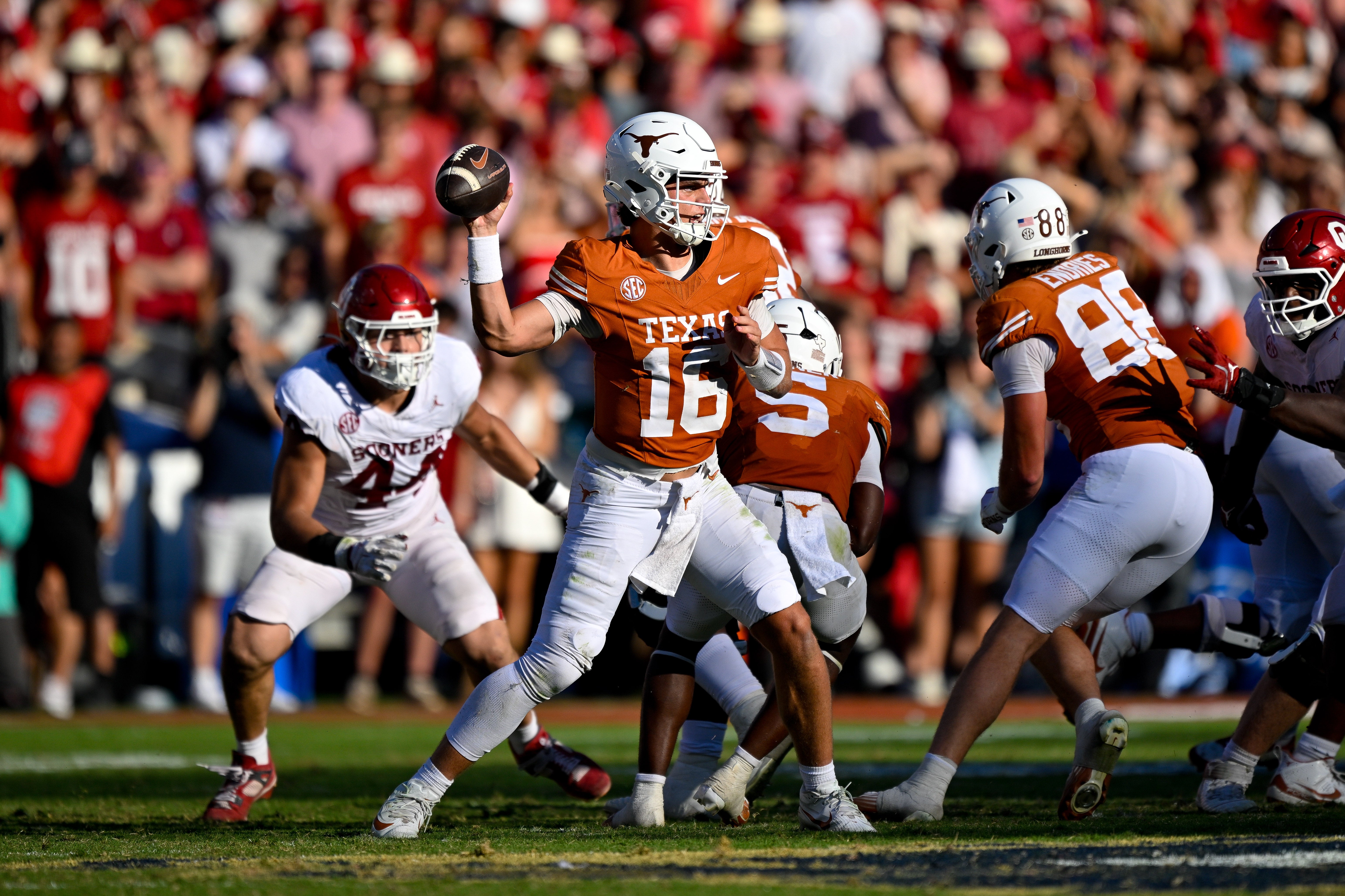 Oct 11, 2025; Dallas, Texas, USA; Texas Longhorns quarterback Arch Manning (16) throws the ball during the second half against the Oklahoma Sooners at the Cotton Bowl.