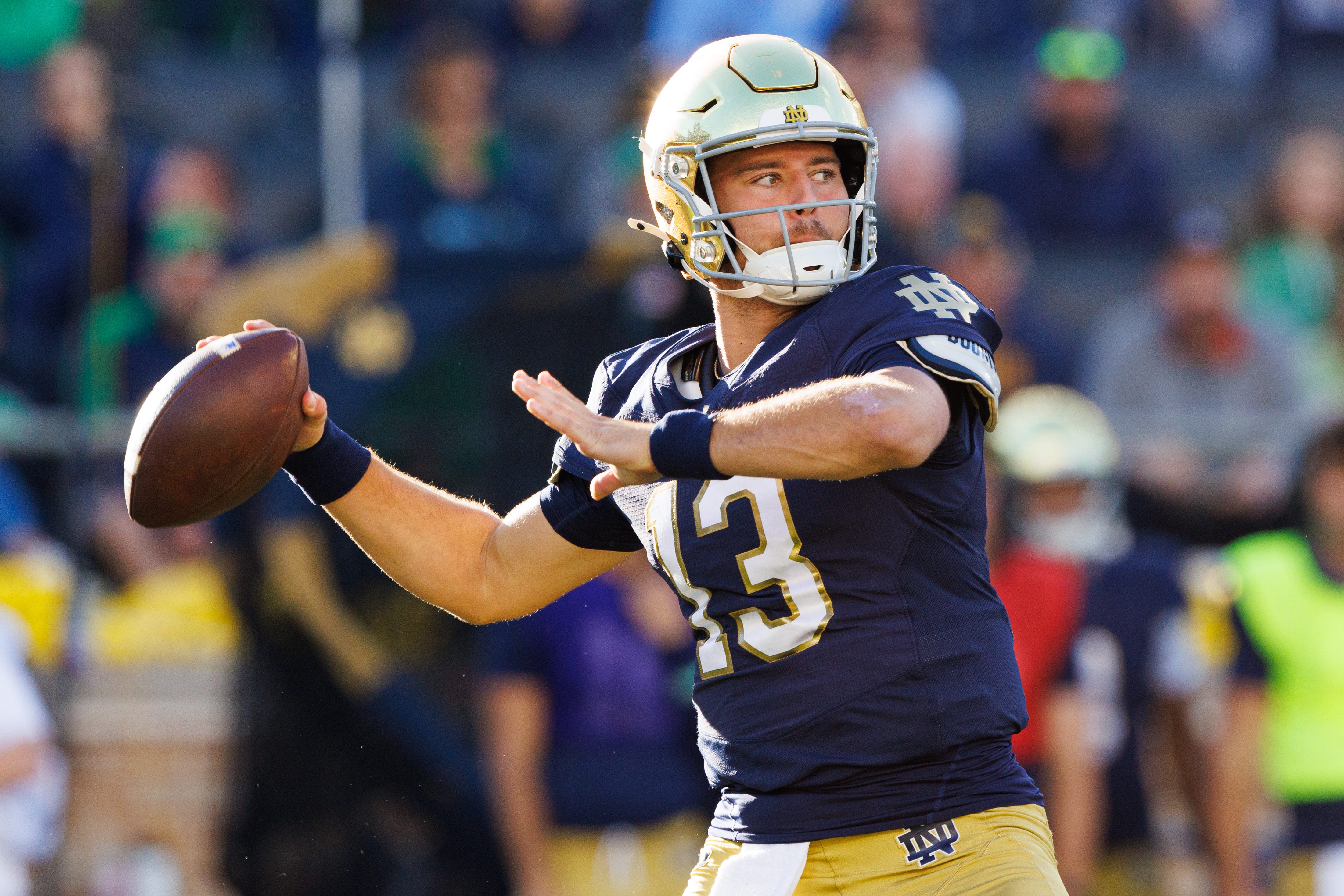 Notre Dame quarterback CJ Carr throws a pass in the second half of a NCAA football game against NC State at Notre Dame Stadium on Saturday, Oct. 11, 2025, in South Bend.