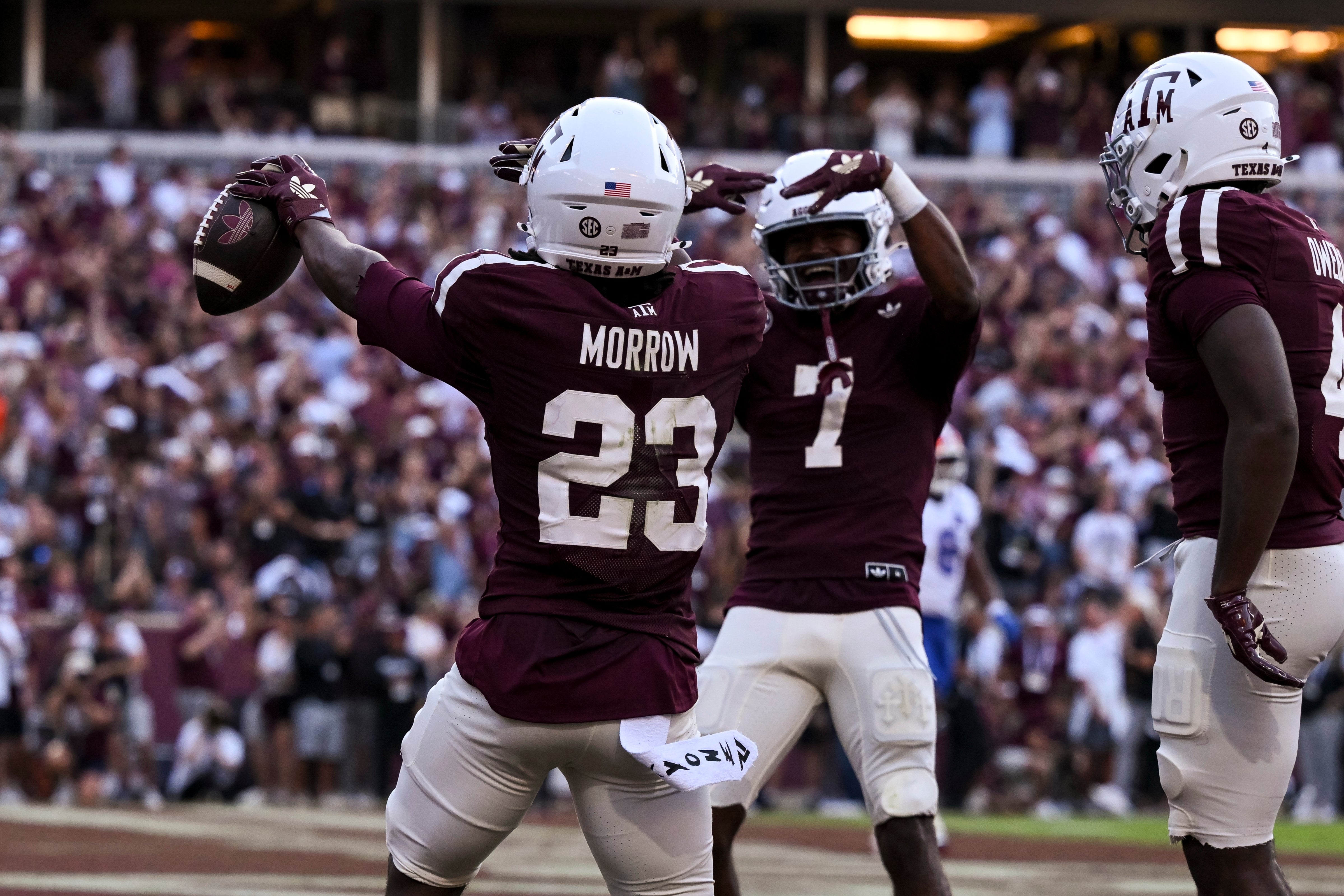 Oct 11, 2025; College Station, Texas, USA; Texas A&M Aggies running back Jamarion Morrow (23) celebrates after scoring a touchdown during the first quarter against the Florida Gators at Kyle Field.