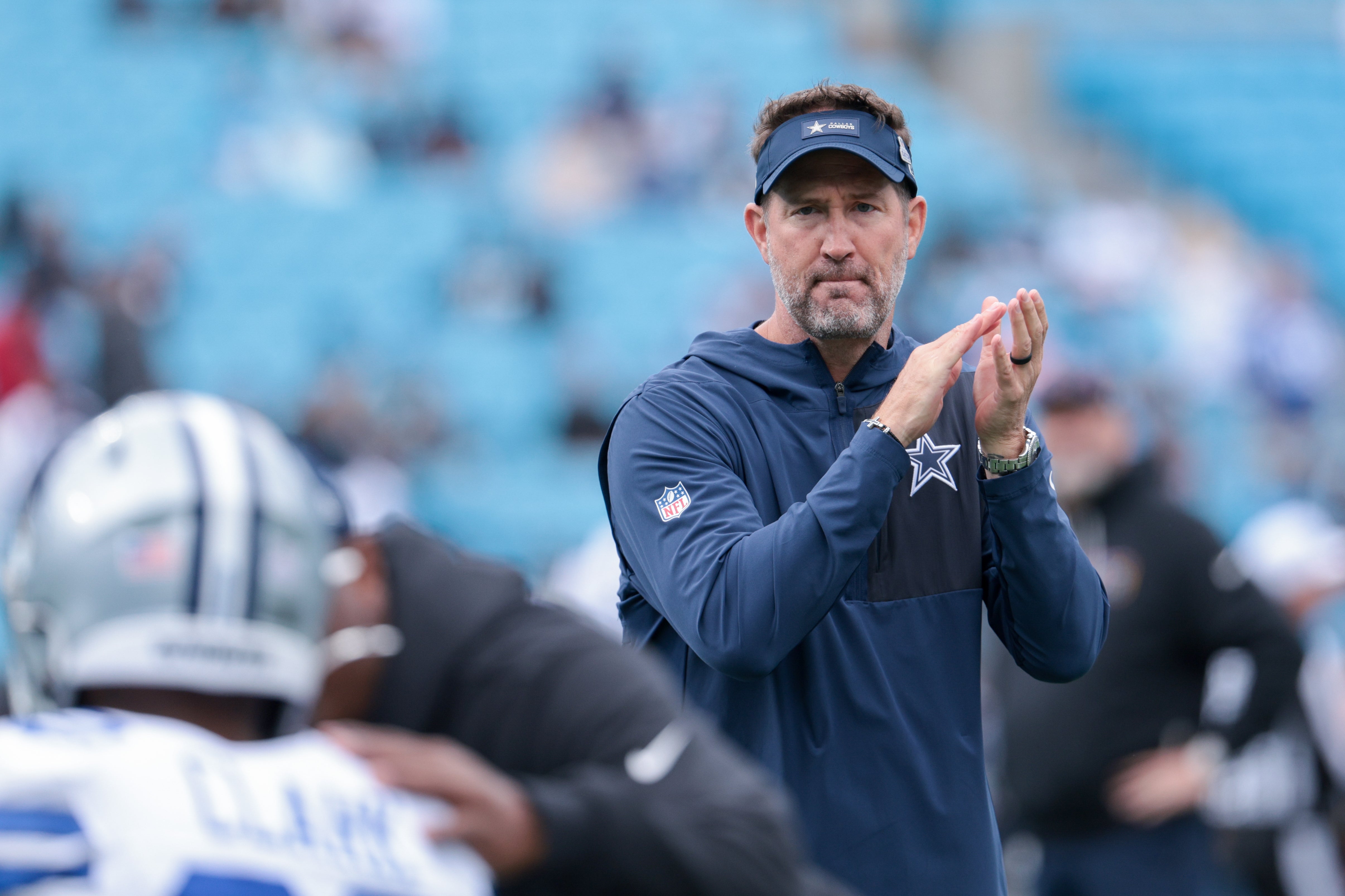 Oct 12, 2025; Charlotte, North Carolina, USA; Dallas Cowboys head coach Brian Schottenheimer looks on before the game against the Carolina Panthers at Bank of America Stadium.