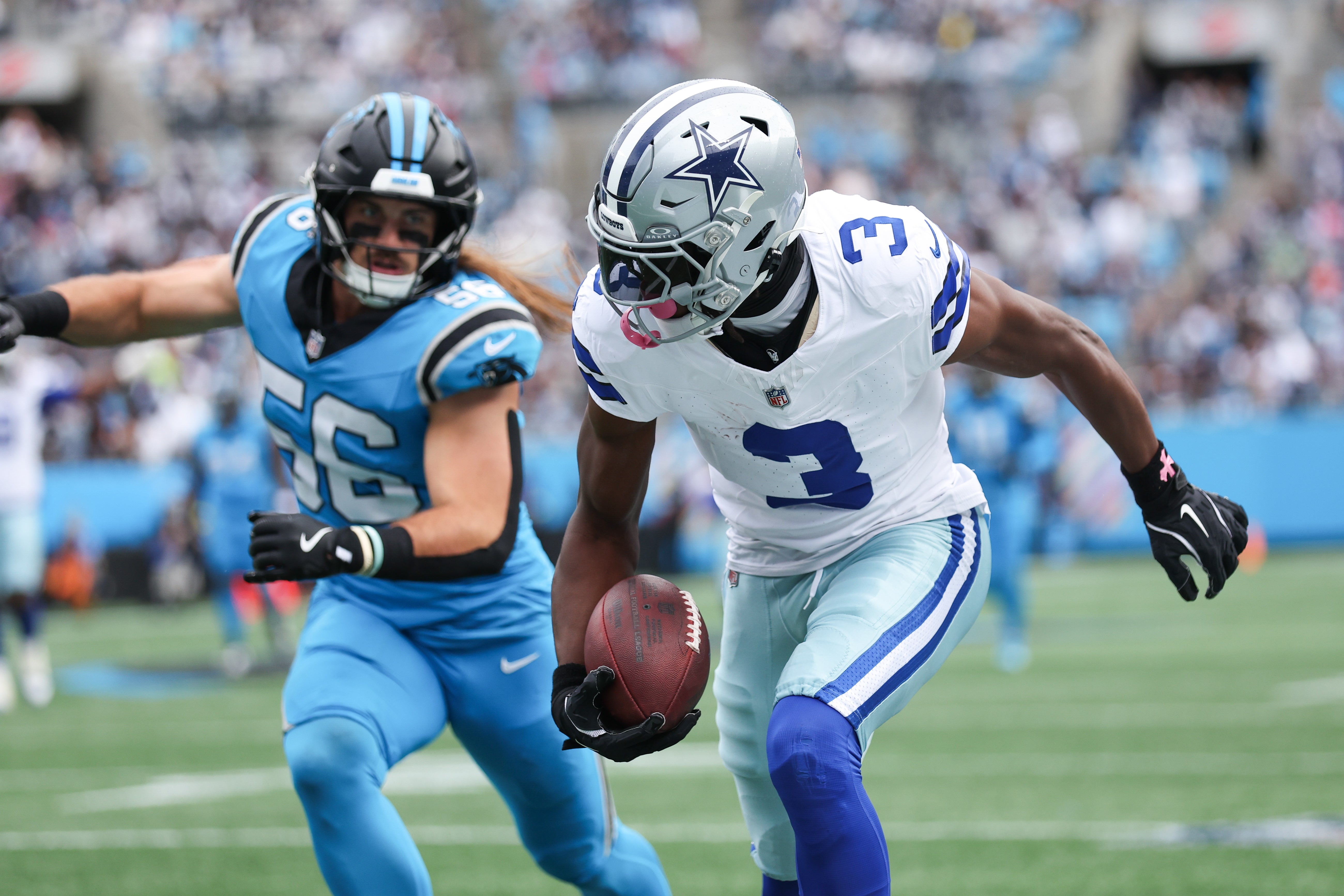 Oct 12, 2025; Charlotte, North Carolina, USA; Dallas Cowboys wide receiver George Pickens (3) runs with the ball during the first quarter against the Carolina Panthers at Bank of America Stadium.