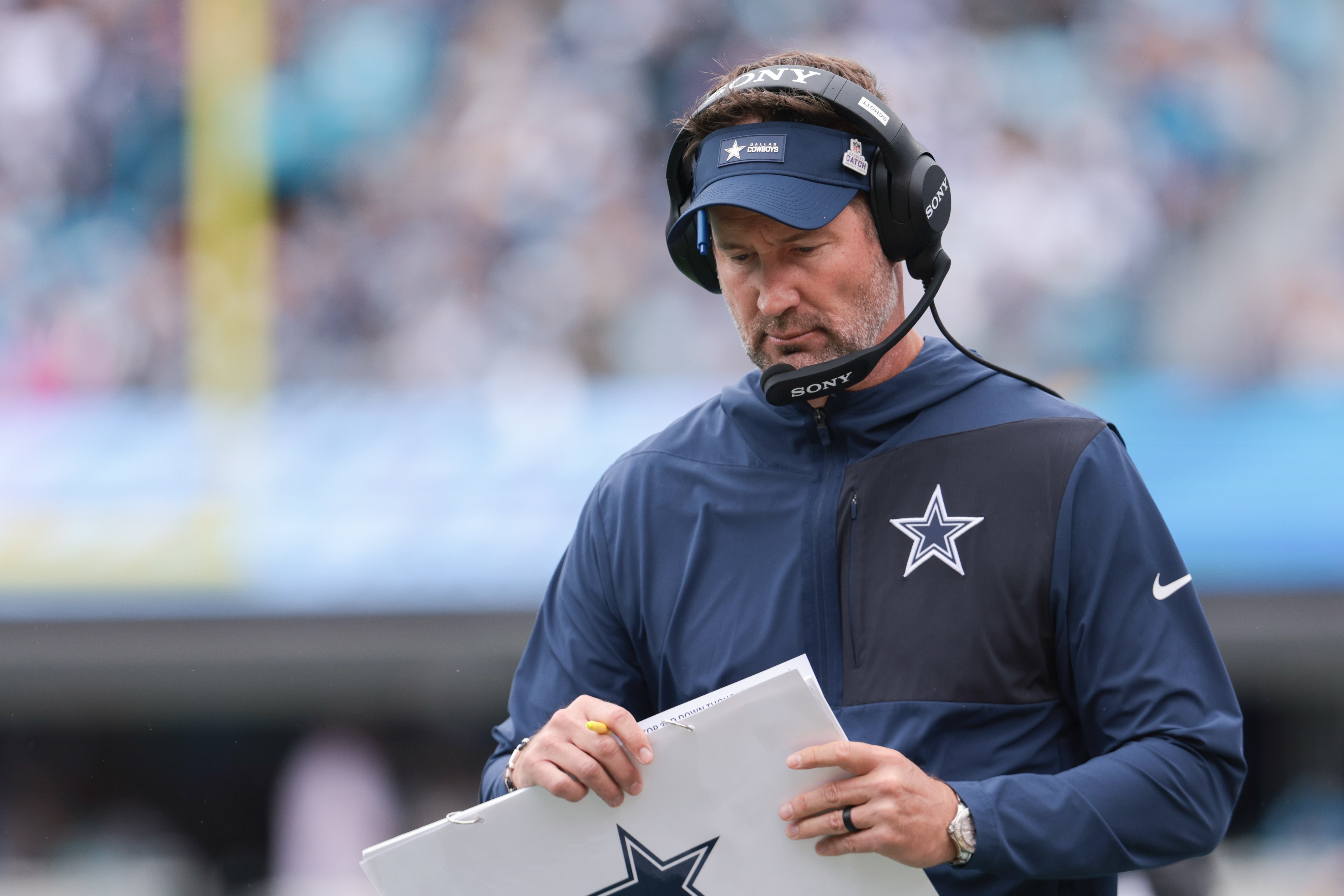 Dallas Cowboys head coach Brian Schottenheimer looks on during the first half against the Carolina Panthers at Bank of America Stadium.