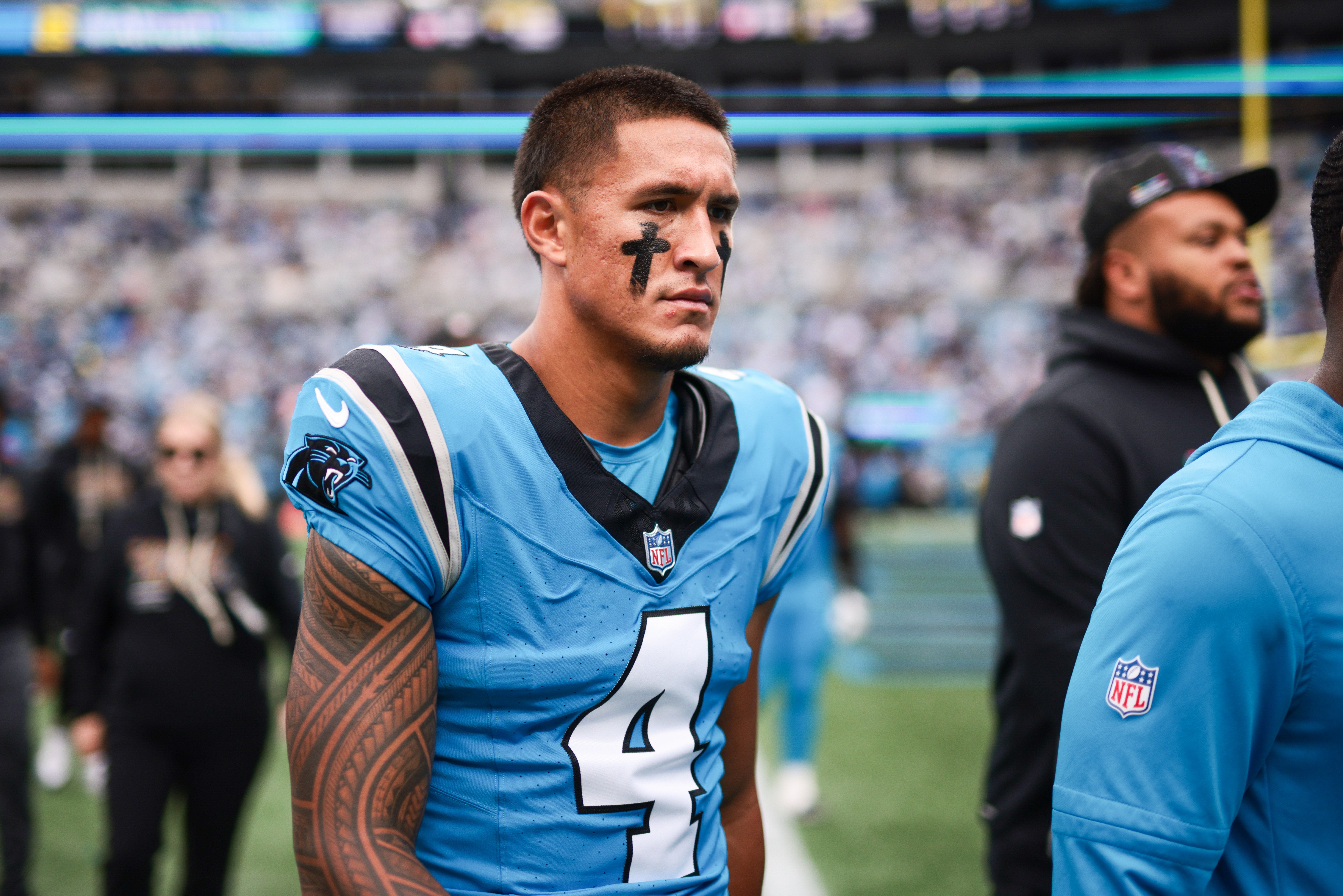 Oct 12, 2025; Charlotte, North Carolina, USA; Carolina Panthers wide receiver Tetairoa McMillan (4) walks off the field during halftime against the Dallas Cowboys at Bank of America Stadium.