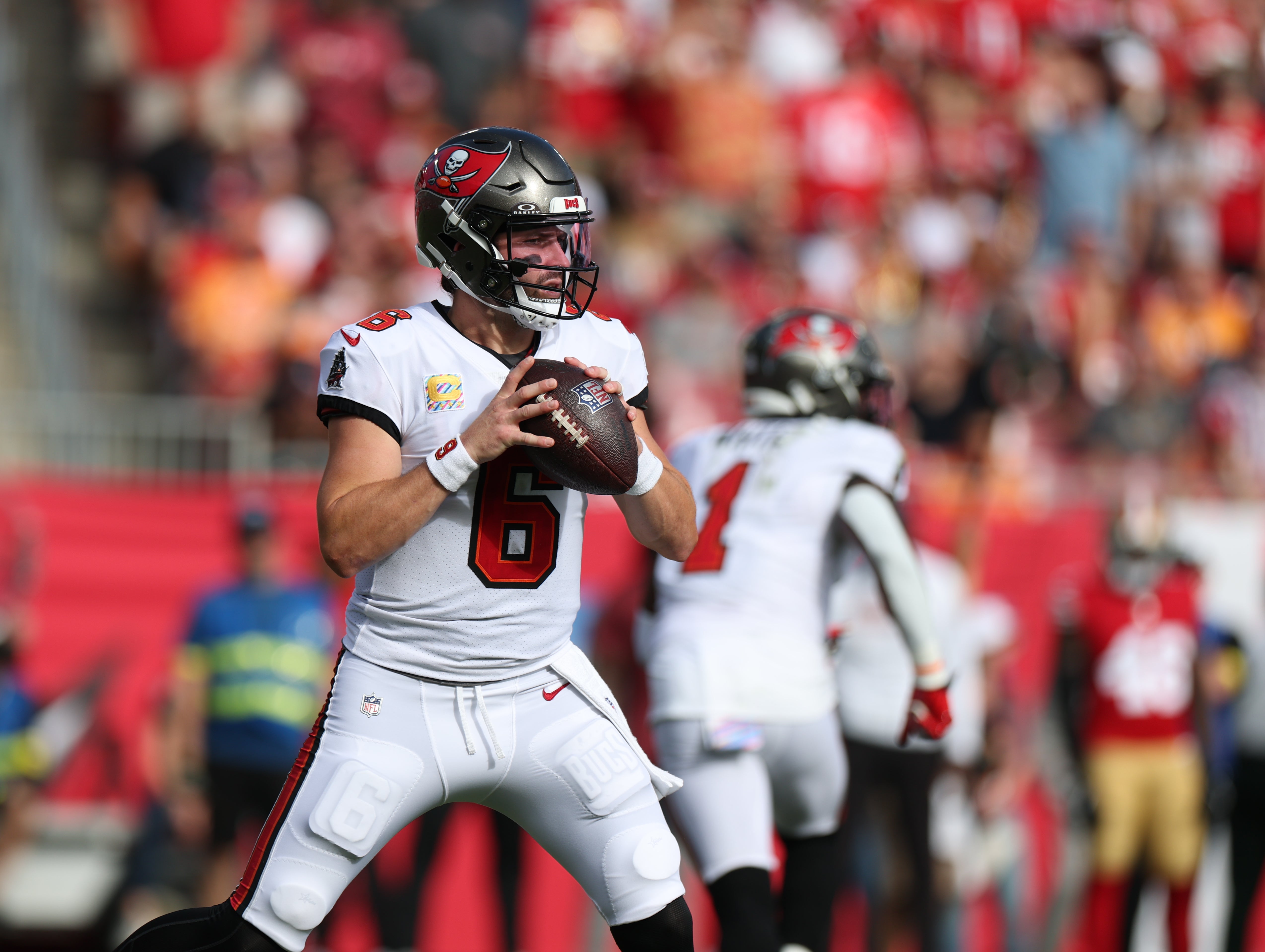 Oct 12, 2025; Tampa, Florida, USA; Tampa Bay Buccaneers quarterback Baker Mayfield (6) throws downfield during the first quarter against the San Francisco 49ers at Raymond James Stadium.