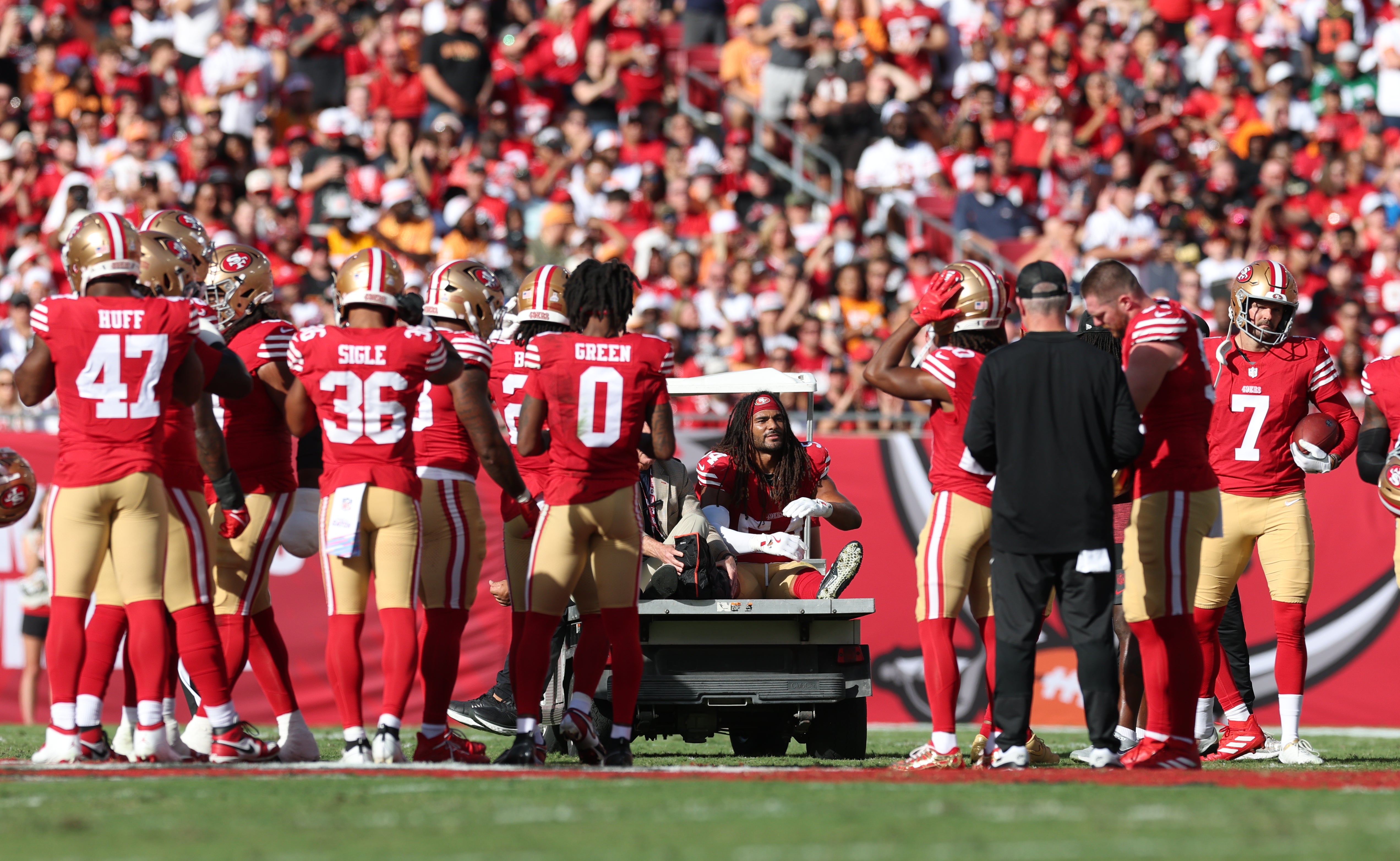 Oct 12, 2025; Tampa, Florida, USA; San Francisco 49ers middle linebacker Fred Warner (54) is carted off the field during the first quarter against the Tampa Bay Buccaneers at Raymond James Stadium.