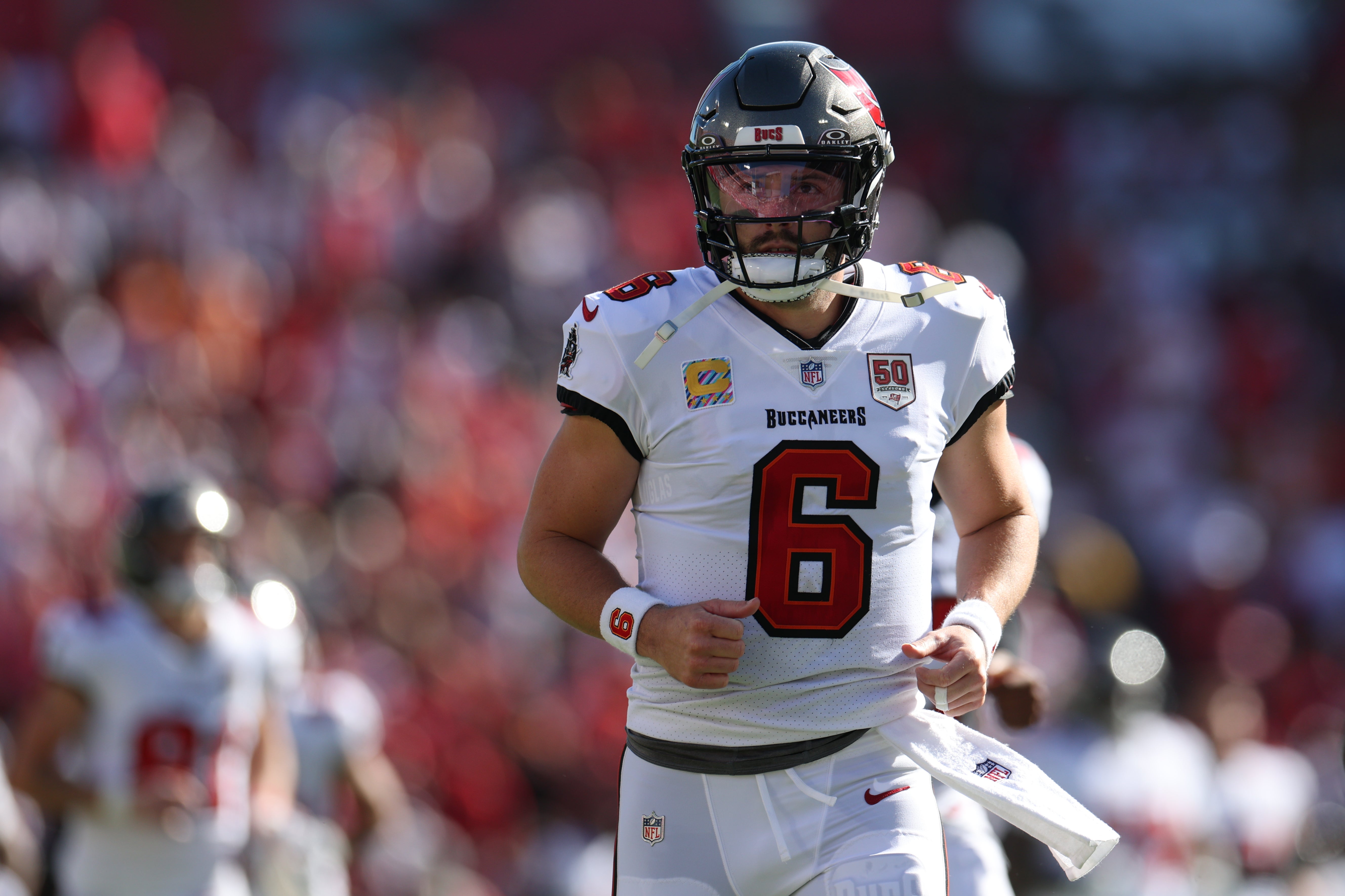 Oct 12, 2025; Tampa, Florida, USA; Tampa Bay Buccaneers quarterback Baker Mayfield (6) runs on the field during the first half against the San Francisco 49ers at Raymond James Stadium.