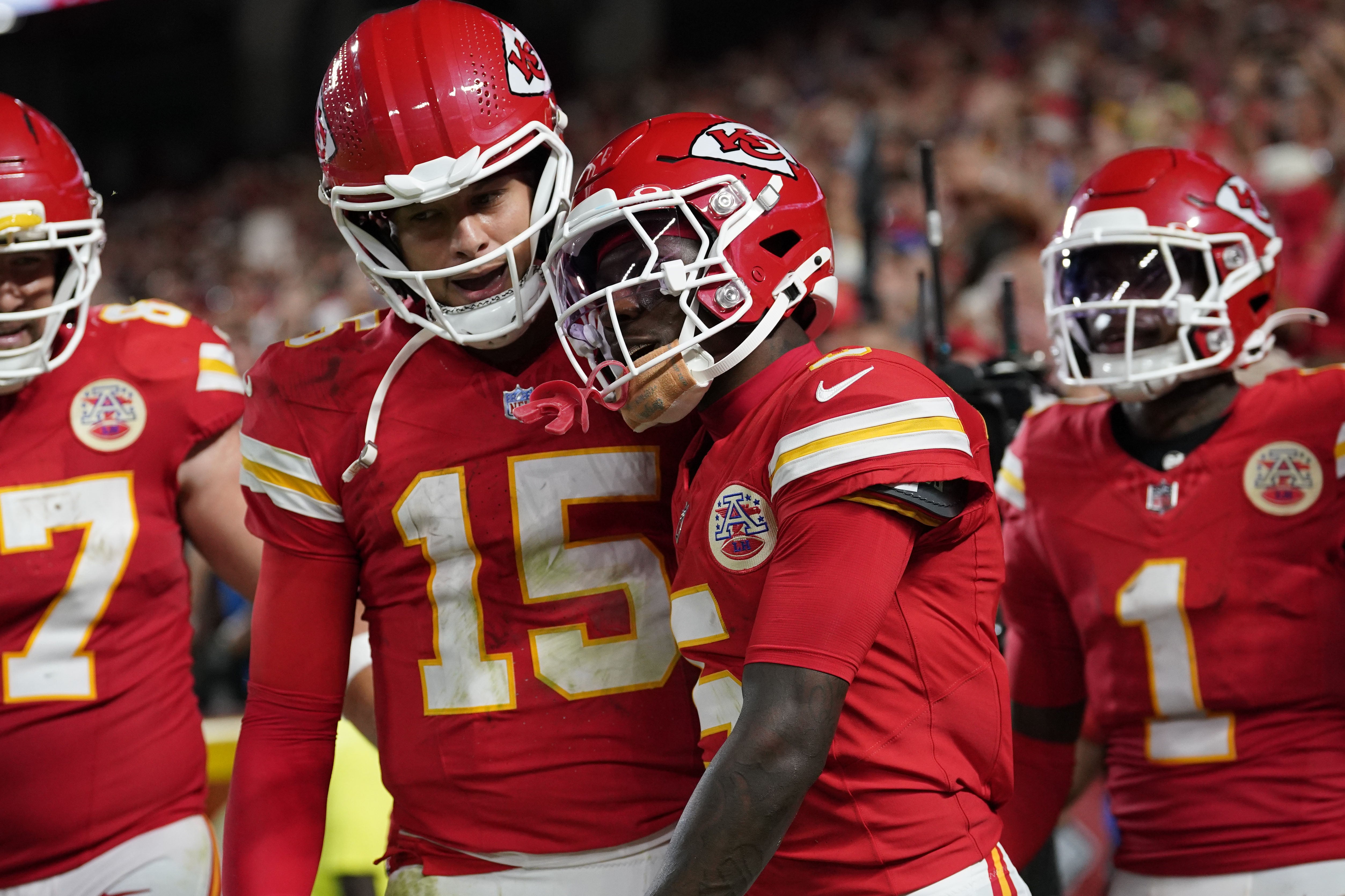 Kansas City Chiefs wide receiver Marquise Brown (5) reacts with quarterback Patrick Mahomes (15) after a touchdown catch