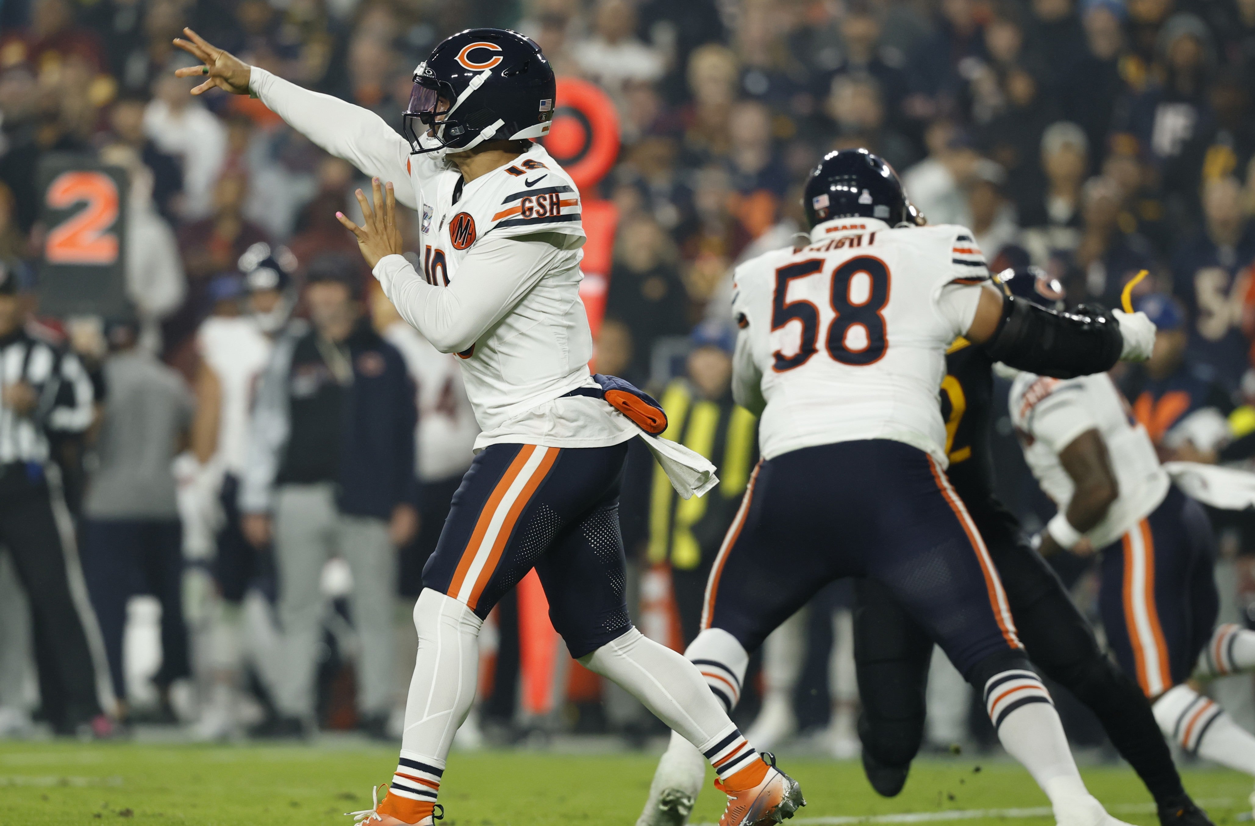 Oct 13, 2025; Landover, Maryland, USA; Chicago Bears quarterback Caleb Williams (18) passes the ball against the Washington Commanders during the first quarter at Northwest Stadium.