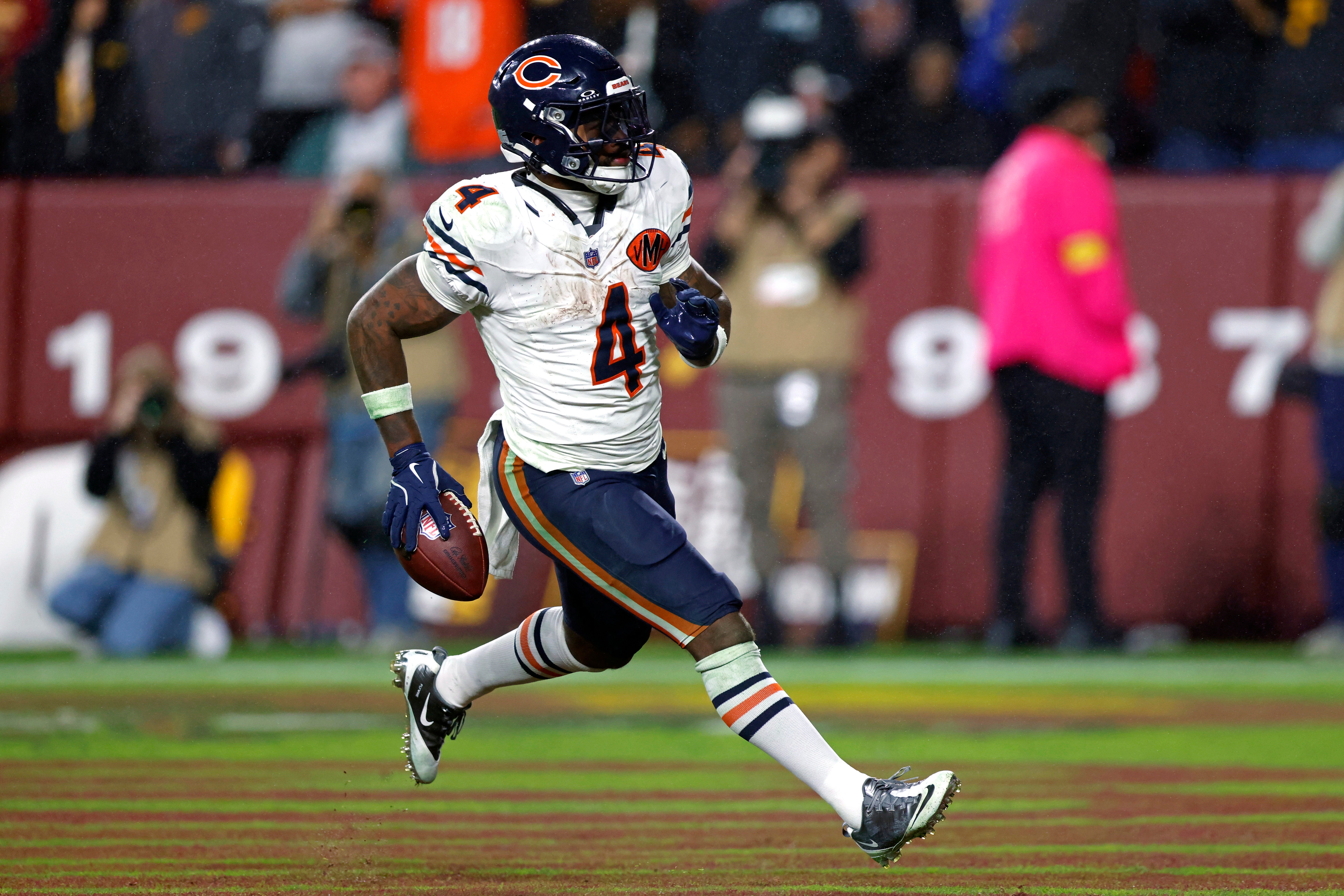 Oct 13, 2025; Landover, Maryland, USA; Chicago Bears running back D'Andre Swift (4) scores a touchdown during the fourth quarter against the Washington Commanders at Northwest Stadium.