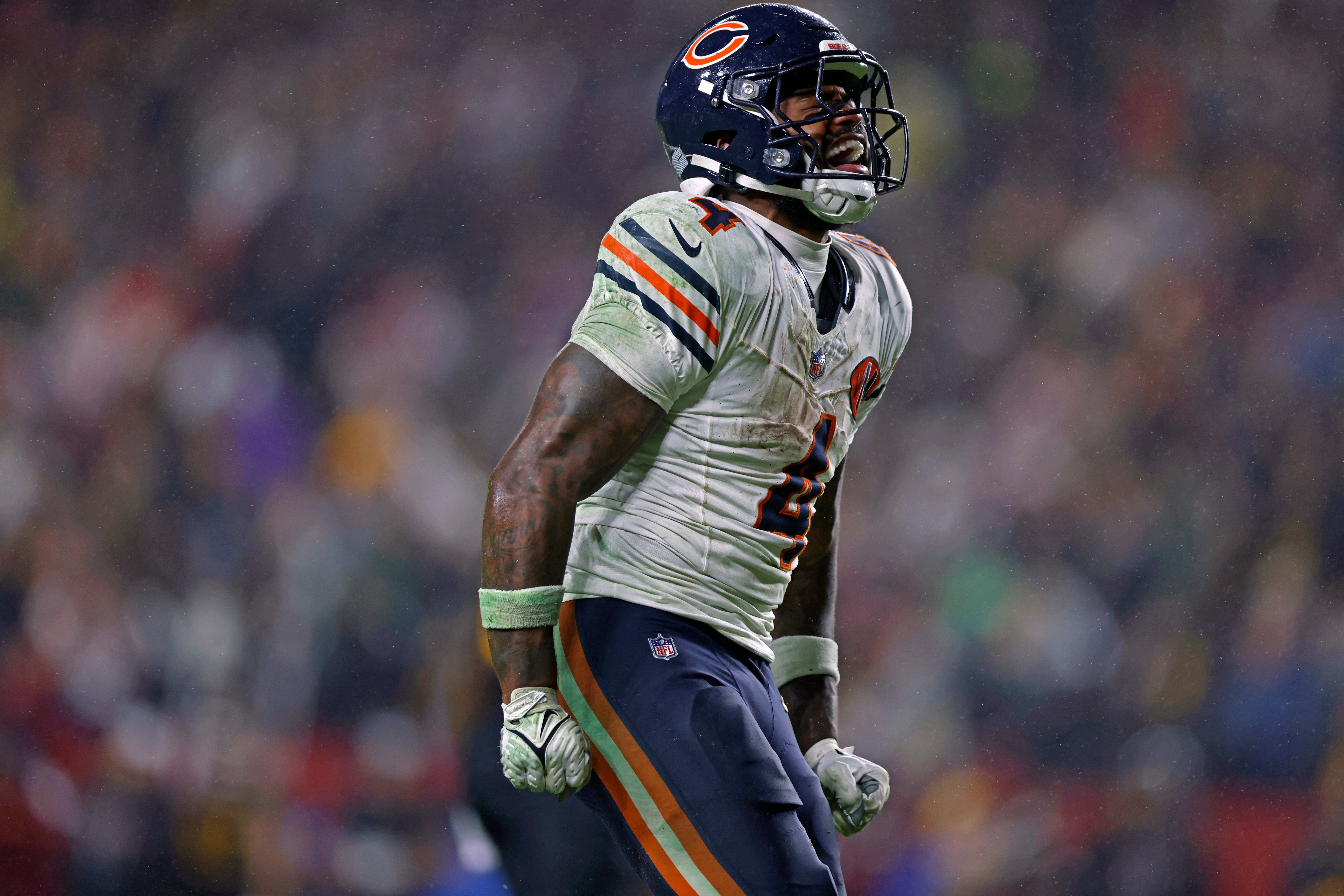 Oct 13, 2025; Landover, Maryland, USA; Chicago Bears running back D'Andre Swift (4) reacts to a first down during the fourth quarter against the Washington Commanders at Northwest Stadium.