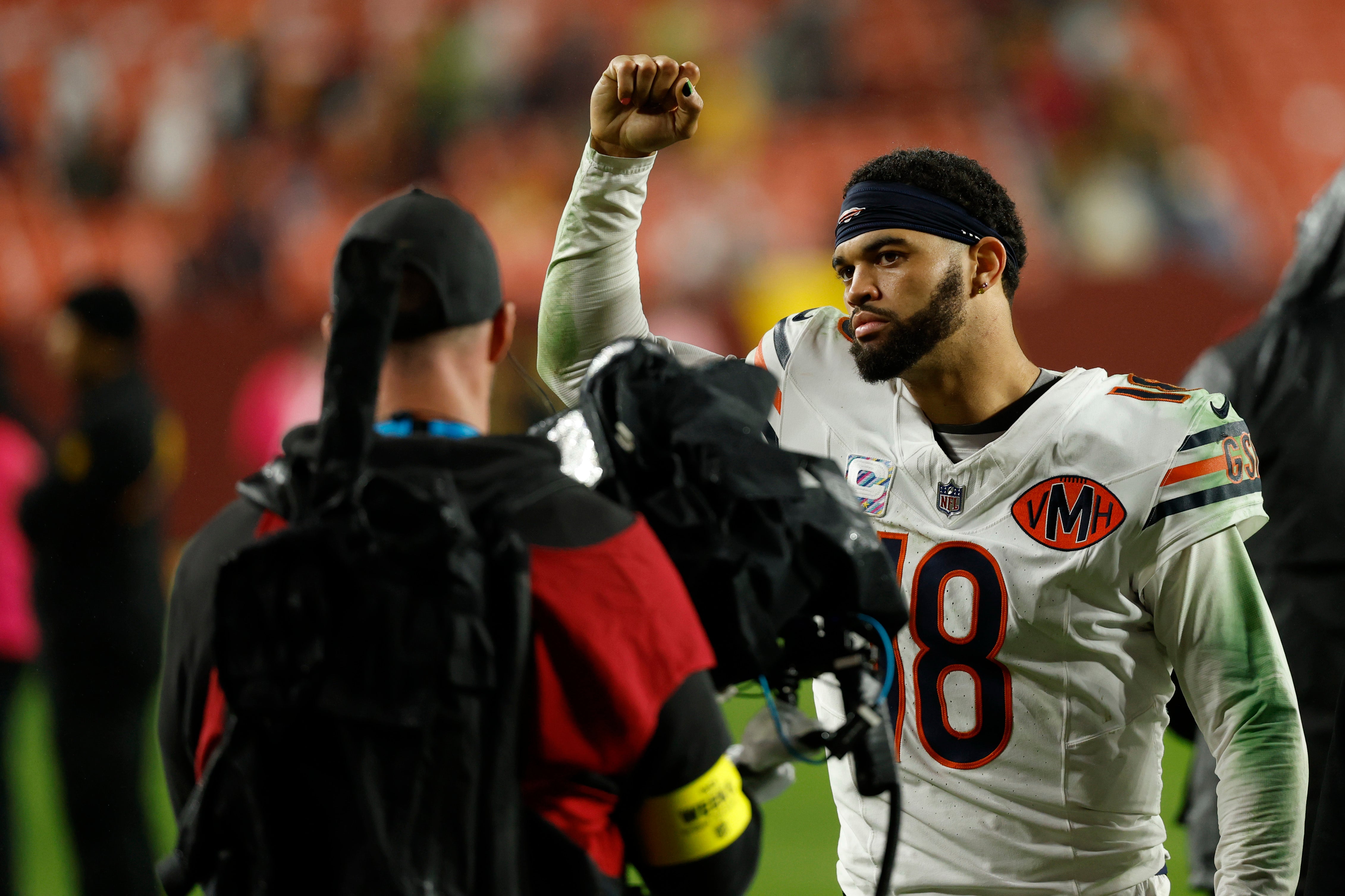 Oct 13, 2025; Landover, Maryland, USA; Chicago Bears quarterback Caleb Williams (18) celebrates while leaving the field after the game against the Washington Commanders at Northwest Stadium.