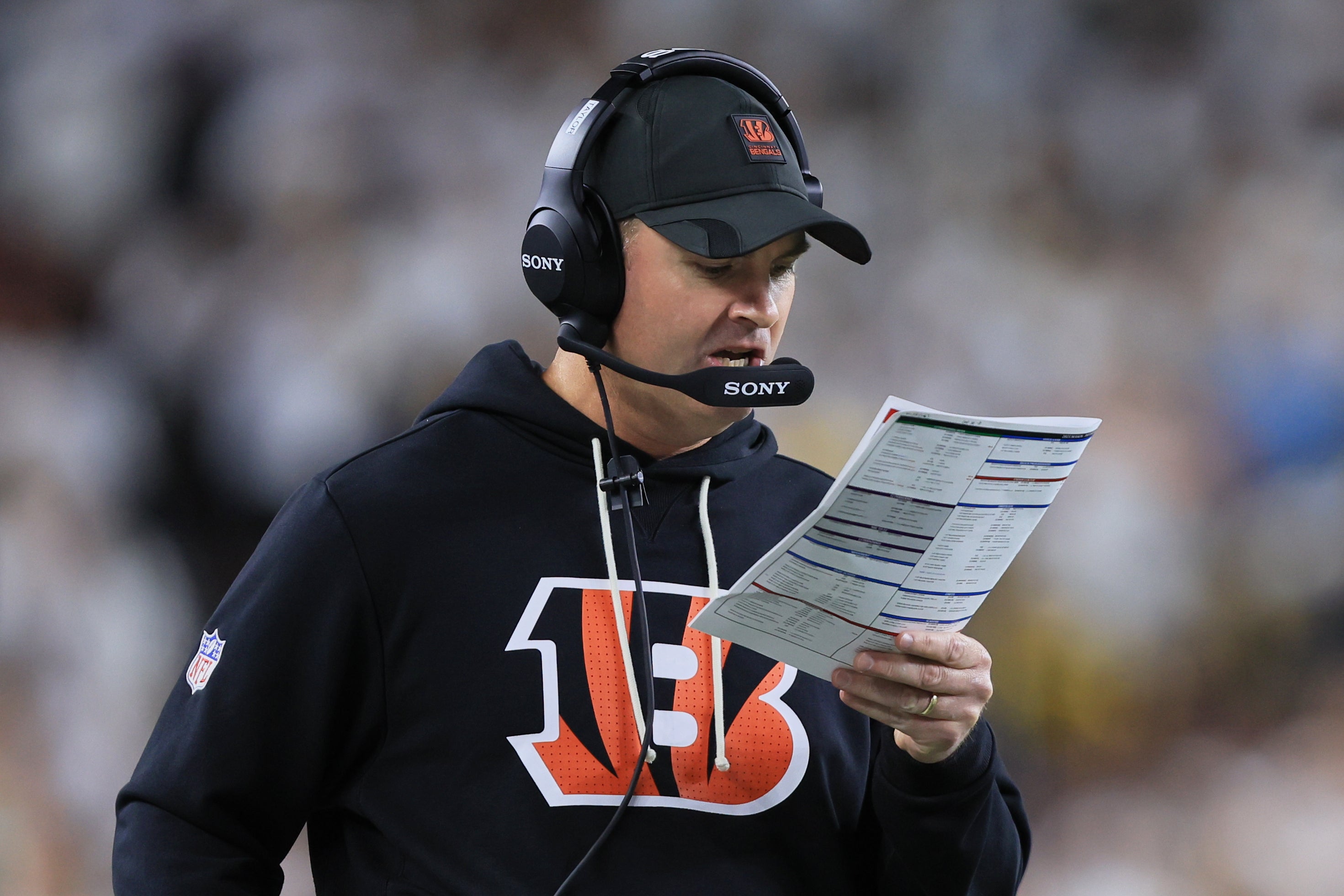 Oct 16, 2025; Cincinnati, Ohio, USA; Cincinnati Bengals head coach Zac Taylor calls a play against the Pittsburgh Steelers during the first half at Paycor Stadium.