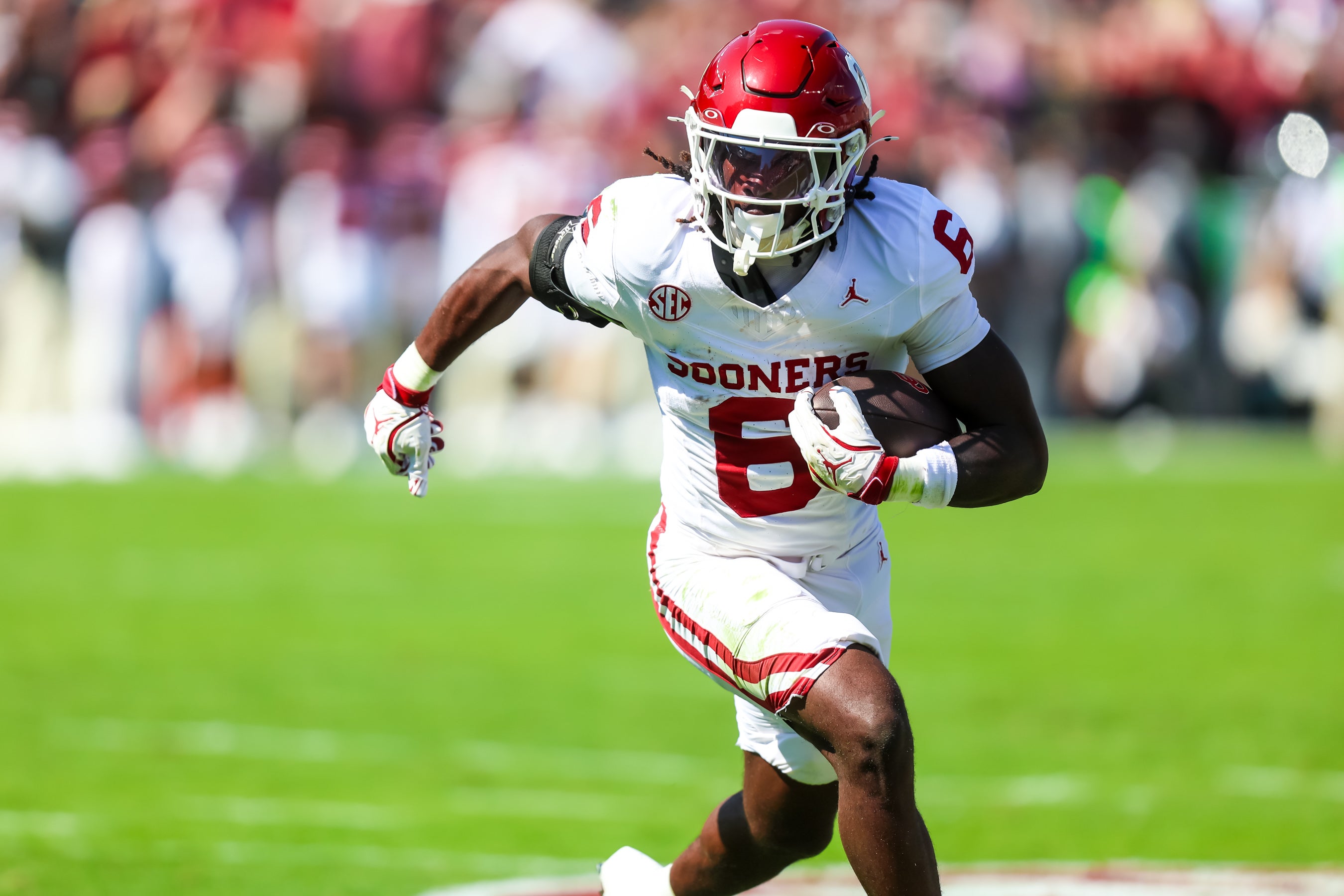Oct 18, 2025; Columbia, South Carolina, USA; Oklahoma Sooners running back Tory Blaylock (6) rushes against the South Carolina Gamecocks in the first quarter at Williams-Brice Stadium.