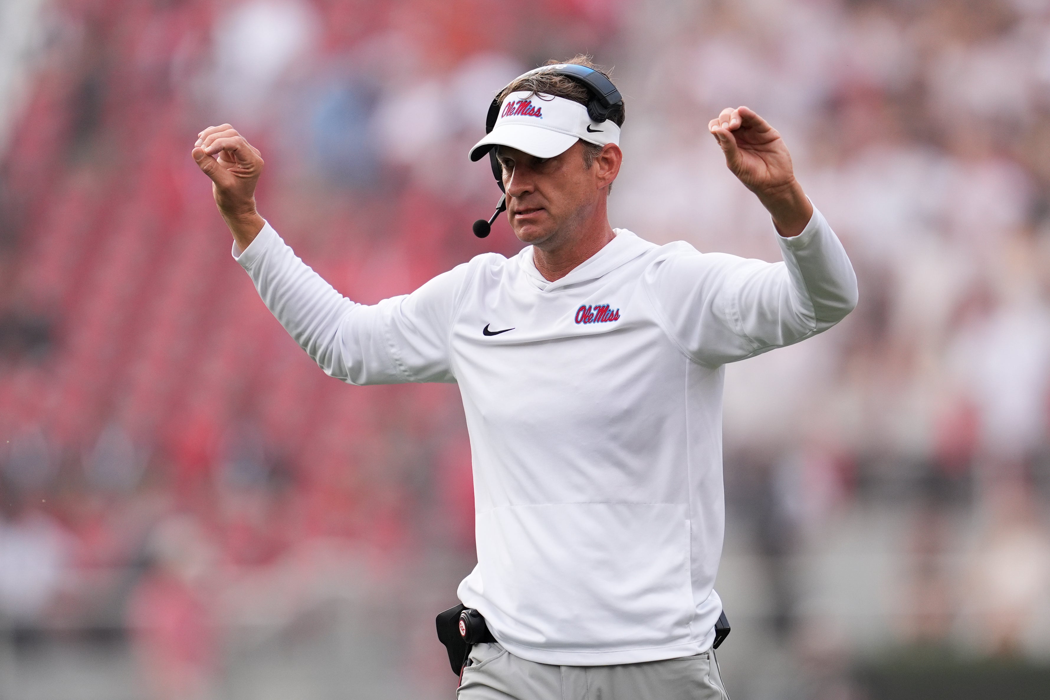 Oct 18, 2025; Athens, Georgia, USA; Mississippi Rebels head coach Lane Kiffin reacts during the second half of the game against the Georgia Bulldogs at Sanford Stadium.