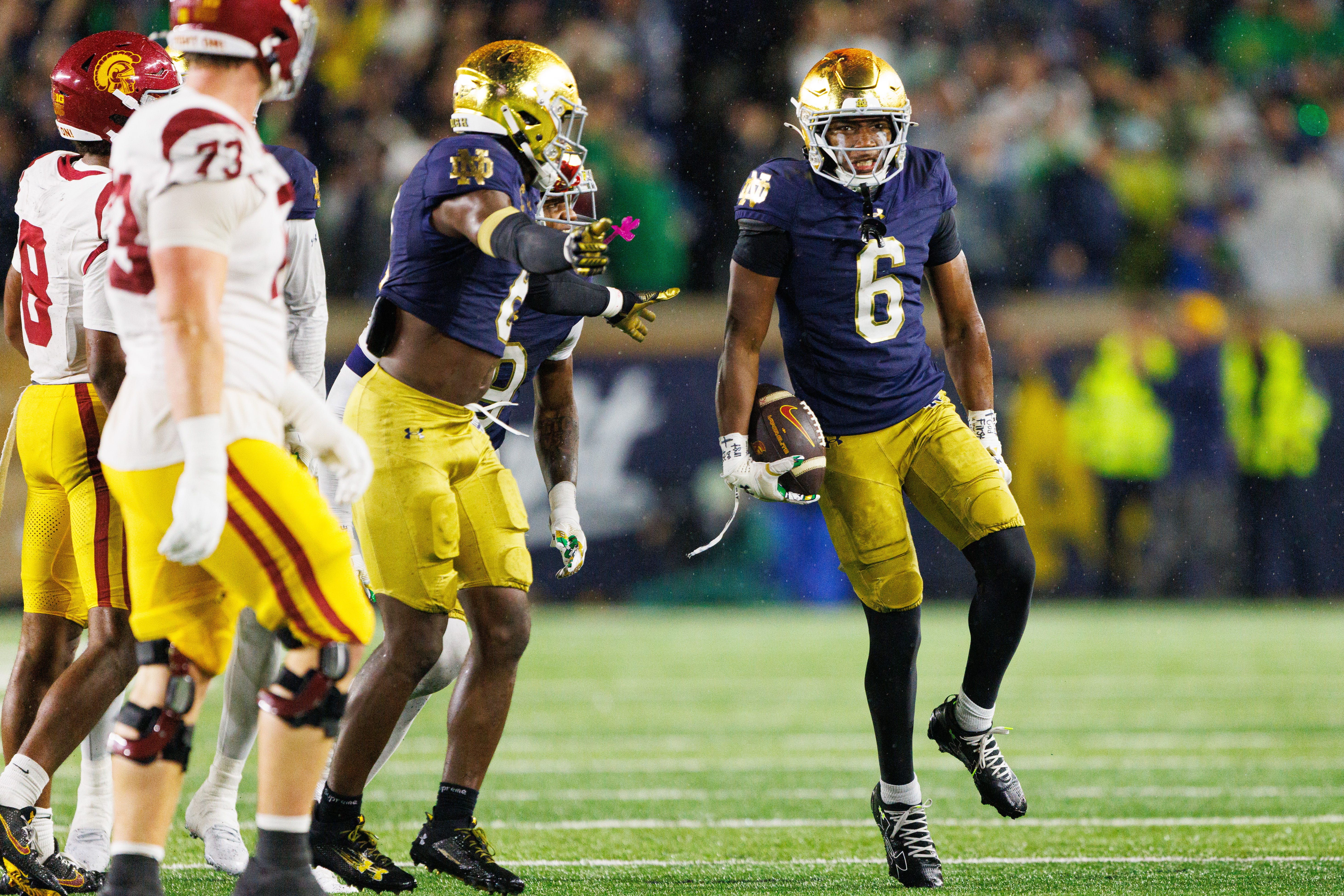 Notre Dame cornerback Christian Gray (6) celebrates after intercepting a pass in the second half of a NCAA football game against Southern California at Notre Dame Stadium on Saturday, Oct. 18, 2025, in South Bend.
