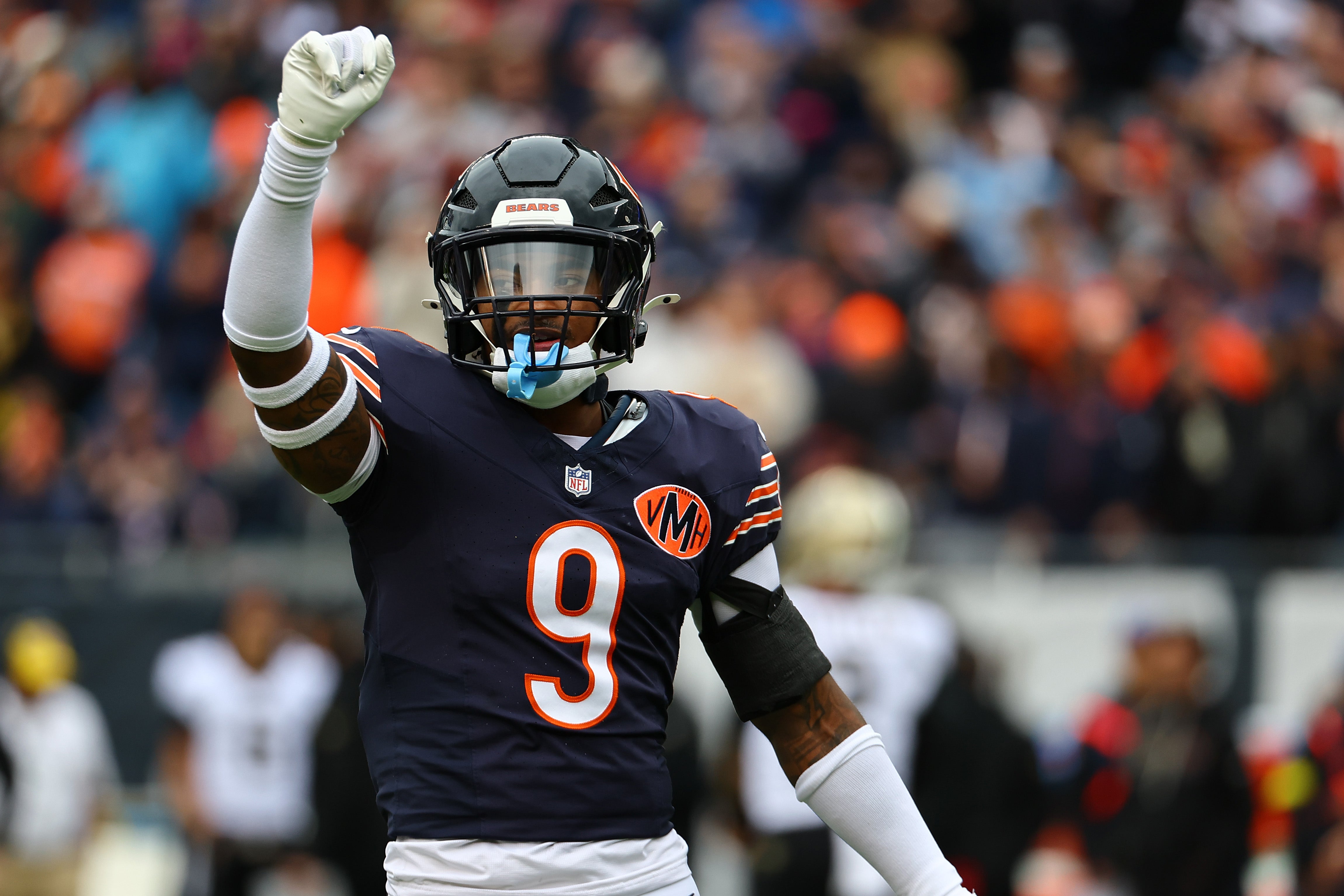 Oct 19, 2025; Chicago, Illinois, USA; Chicago Bears safety Jaquan Brisker (9) reacts against the New Orleans Saints during the first quarter at Soldier Field.