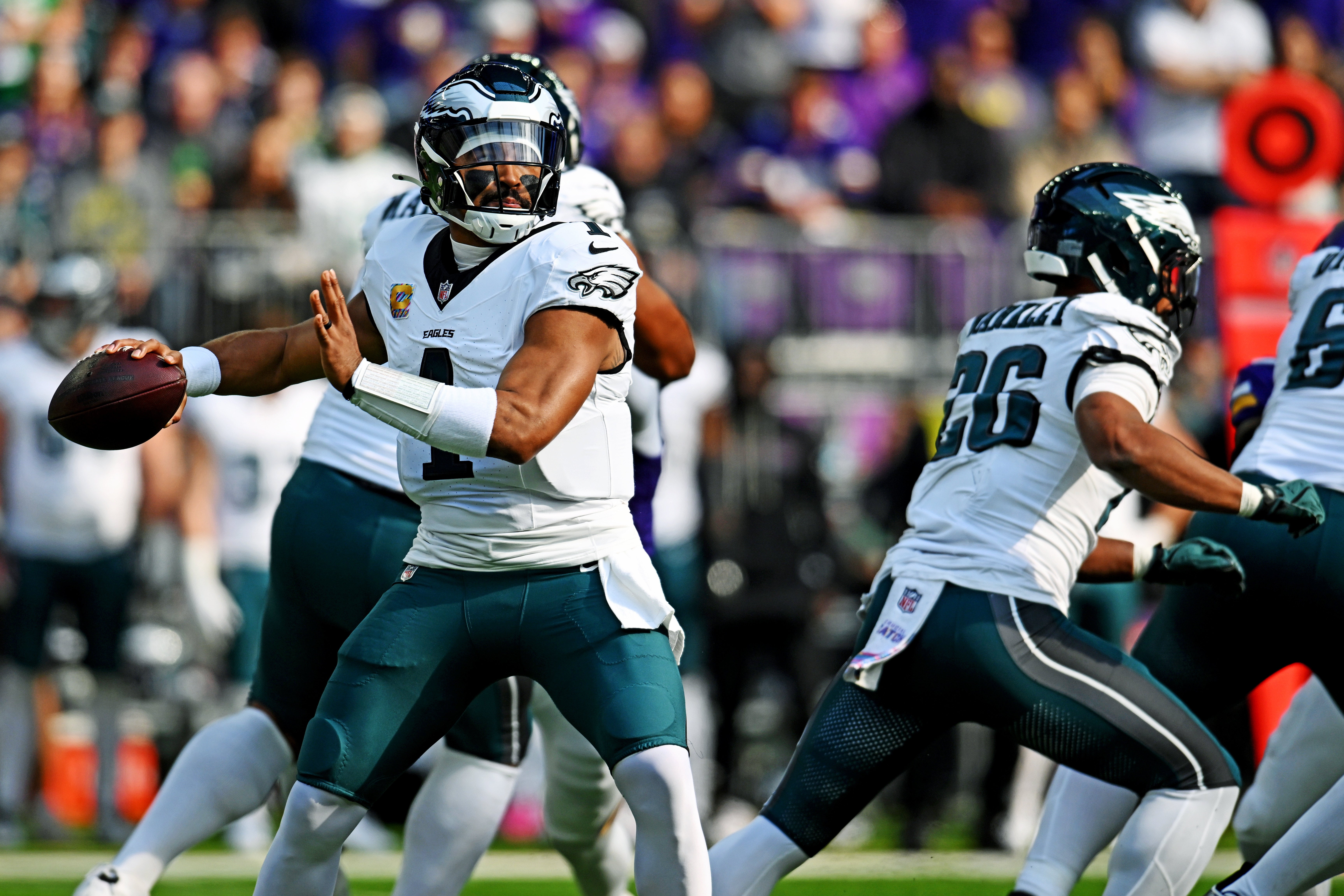 Philadelphia Eagles quarterback Jalen Hurts (1) passes the ball during the first half against the Minnesota Vikings at U.S. Bank Stadium.