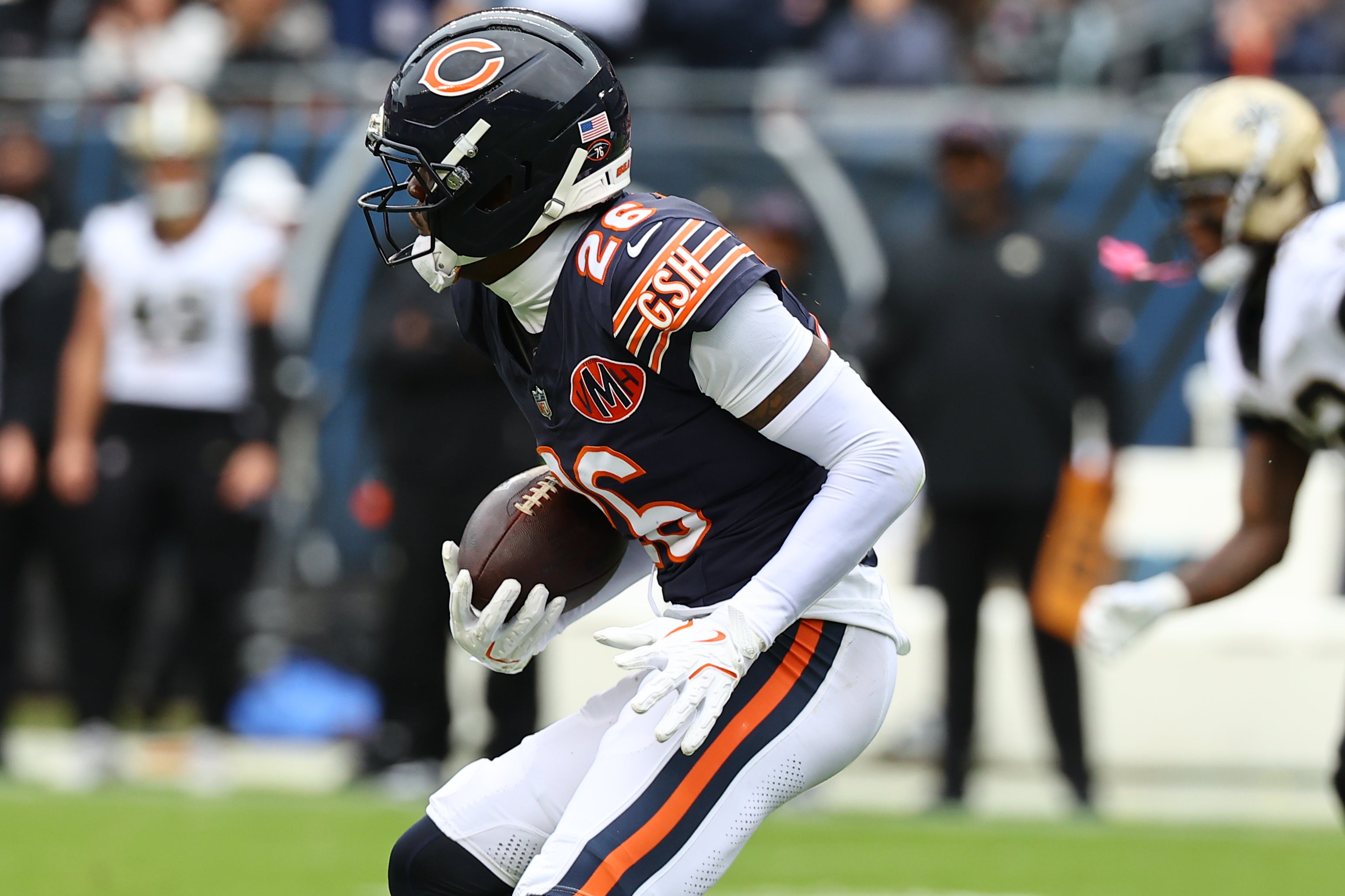 Oct 19, 2025; Chicago, Illinois, USA; Chicago Bears cornerback Nahshon Wright (26) intercepts a pass against the New Orleans Saints during the second quarter at Soldier Field.