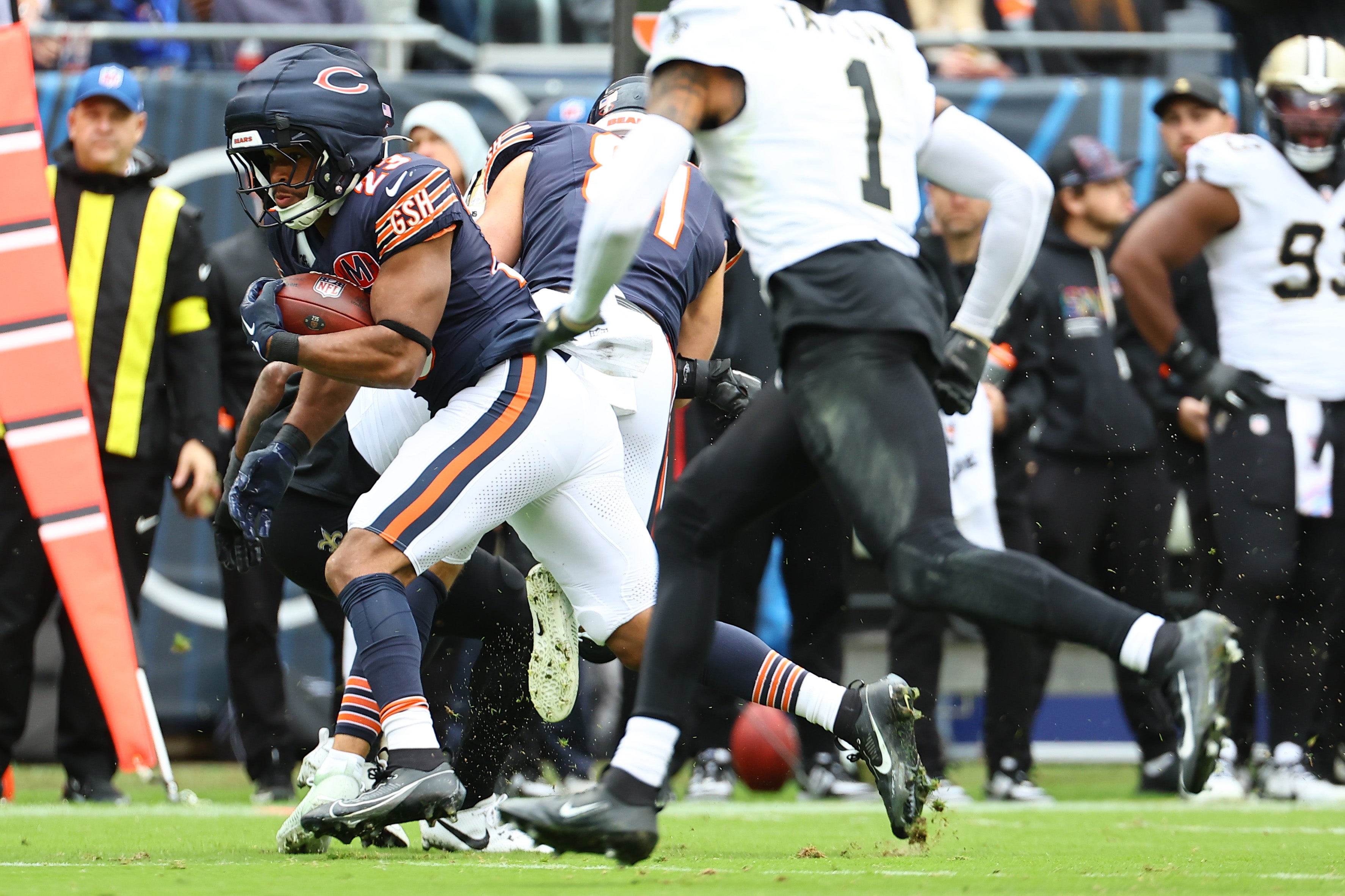 Oct 19, 2025; Chicago, Illinois, USA; Chicago Bears running back Roschon Johnson (23) rushes the ball against the New Orleans Saints during the second quarter at Soldier Field.
