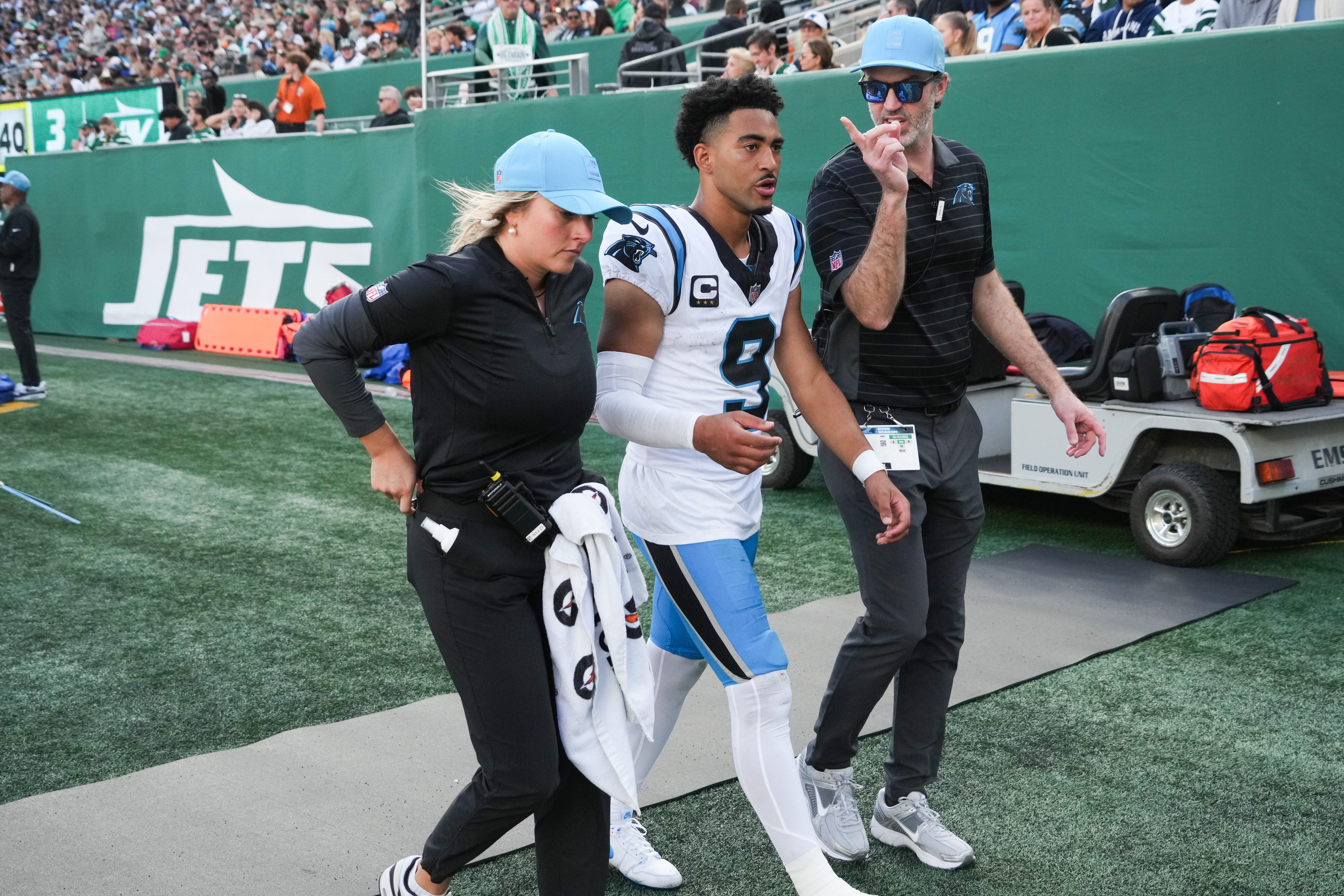 Oct 19, 2025; East Rutherford, New Jersey, USA; Carolina Panthers quarterback Bryce Young (9) exits the field during the third quarter against the New York Jets at MetLife Stadium.