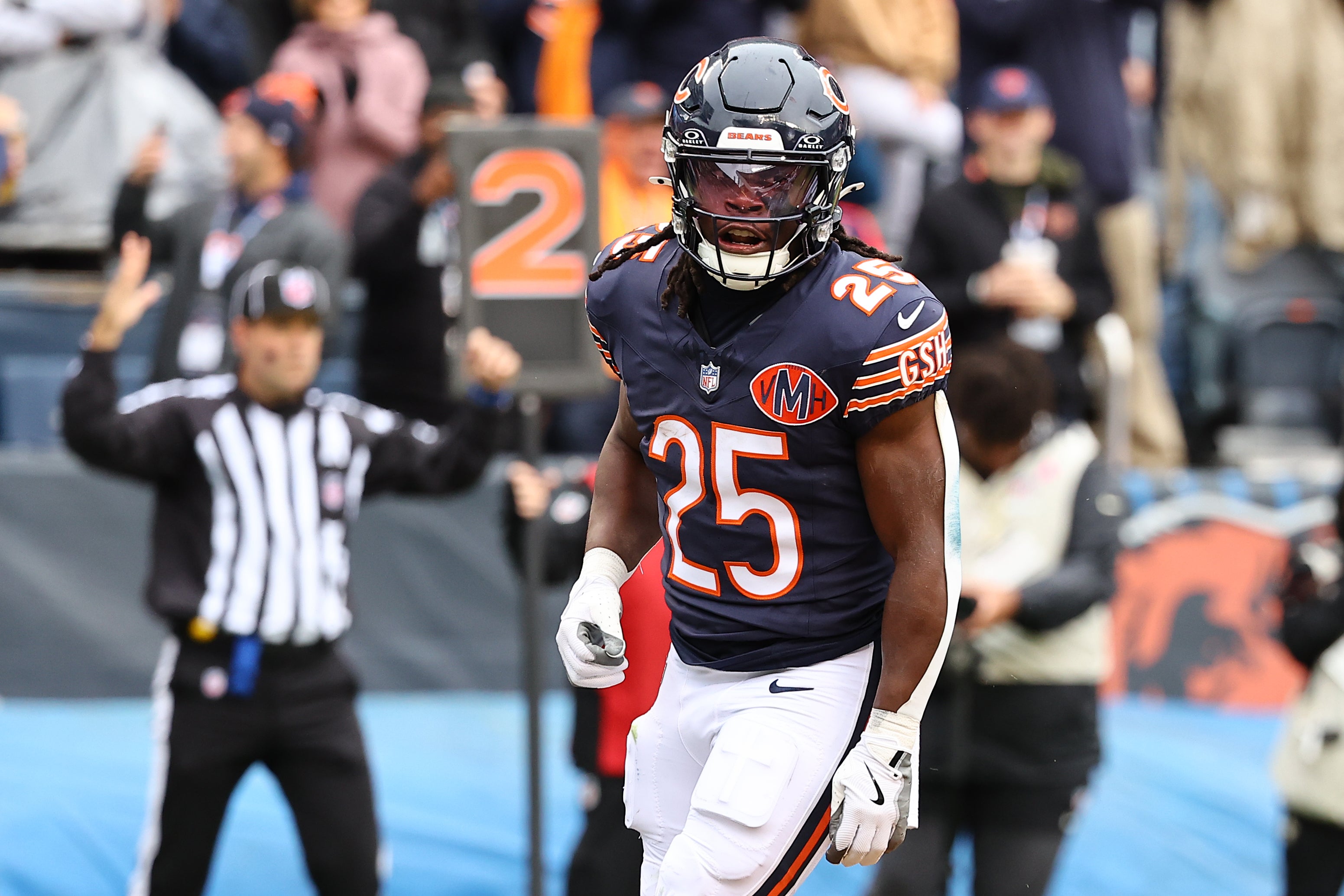 Oct 19, 2025; Chicago, Illinois, USA; Chicago Bears running back Kyle Monangai (25) reacts after rushing for a touchdown against the New Orleans Saints during the second quarter at Soldier Field.