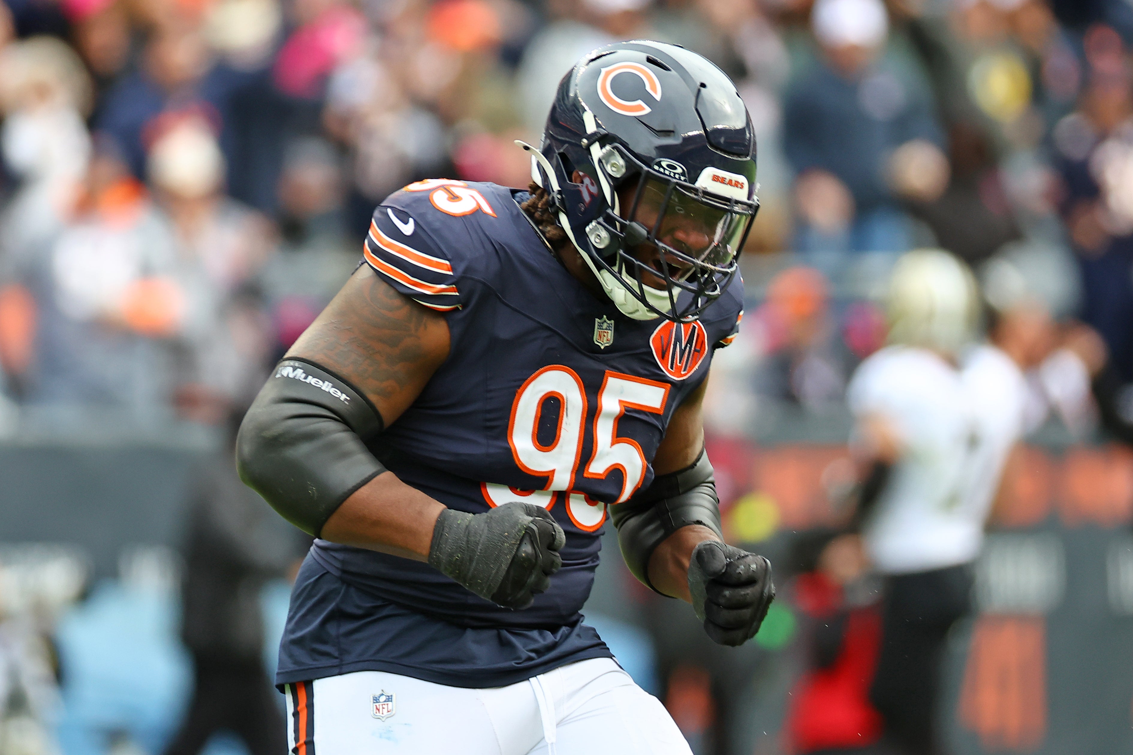 Oct 19, 2025; Chicago, Illinois, USA; Chicago Bears defensive tackle Shemar Turner (95) reacts against the New Orleans Saints during the second half at Soldier Field.