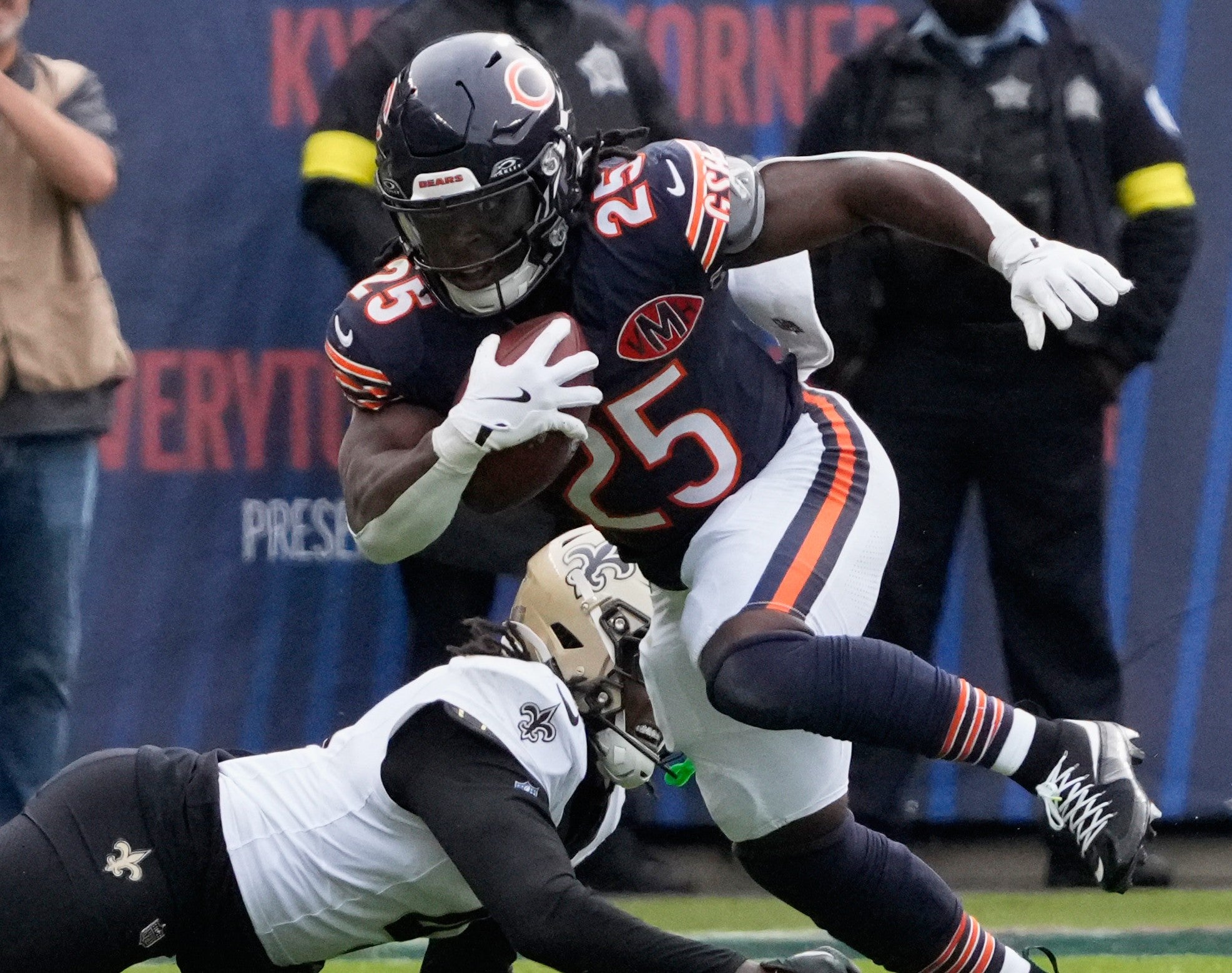 Oct 19, 2025; Chicago, Illinois, USA; Chicago Bears running back Kyle Monangai (25) runs the ball against the New Orleans Saints during the second half at Soldier Field.