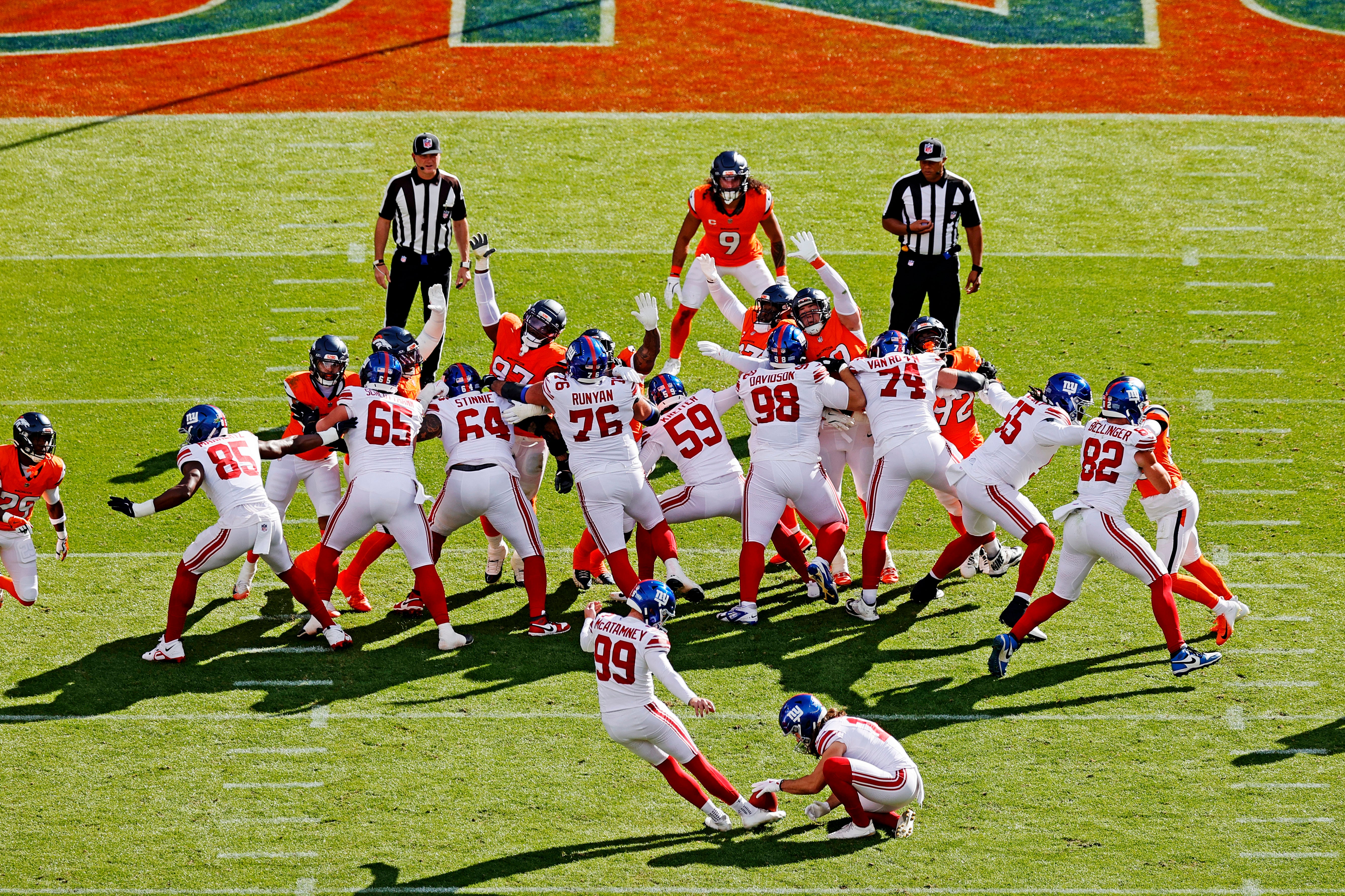 Oct 19, 2025; Denver, Colorado, USA; New York Giants kicker Jude McAtamney (99) kicks a field goal during the second half against the Denver Broncos at Empower Field at Mile High.