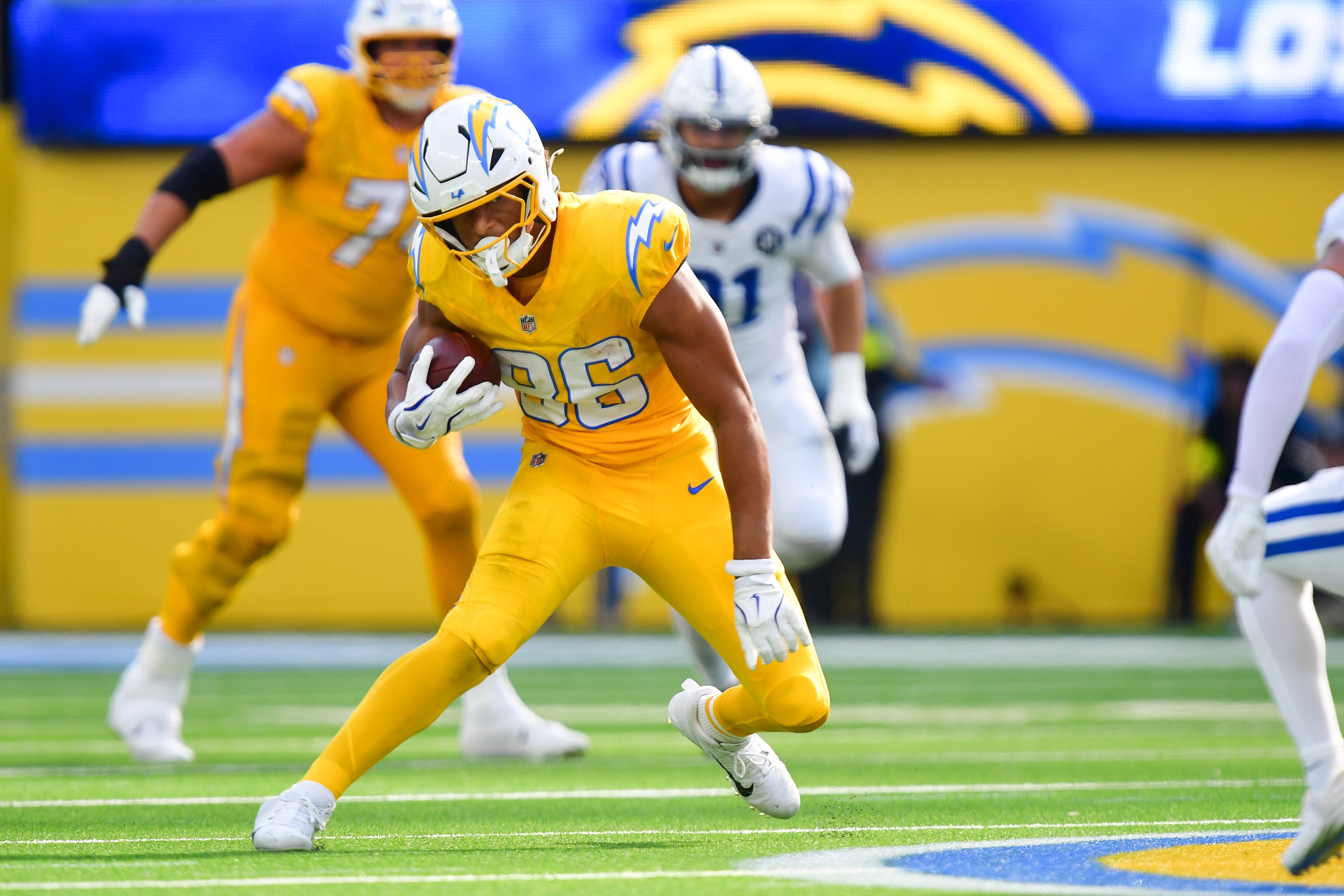 Oct 19, 2025; Inglewood, California, USA; Los Angeles Chargers tight end Oronde Gadsden (86) runs with the ball in the second half against the Indianapolis Colts at SoFi Stadium. Mandatory Credit: Gary A. Vasquez-Imagn Images