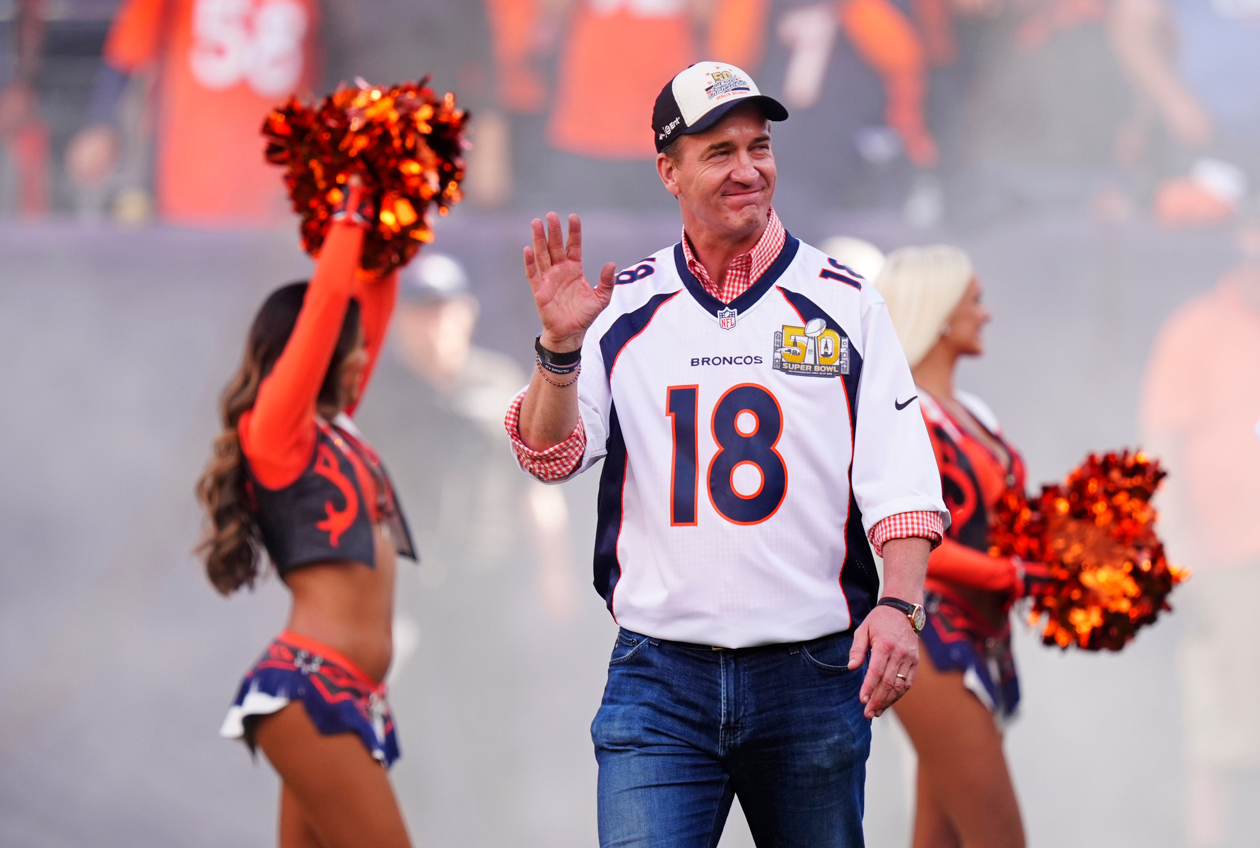 Oct 19, 2025; Denver, Colorado, USA; Peyton Manning looks on during the game between the New York Giants and the Denver Broncos at Empower Field at Mile High.