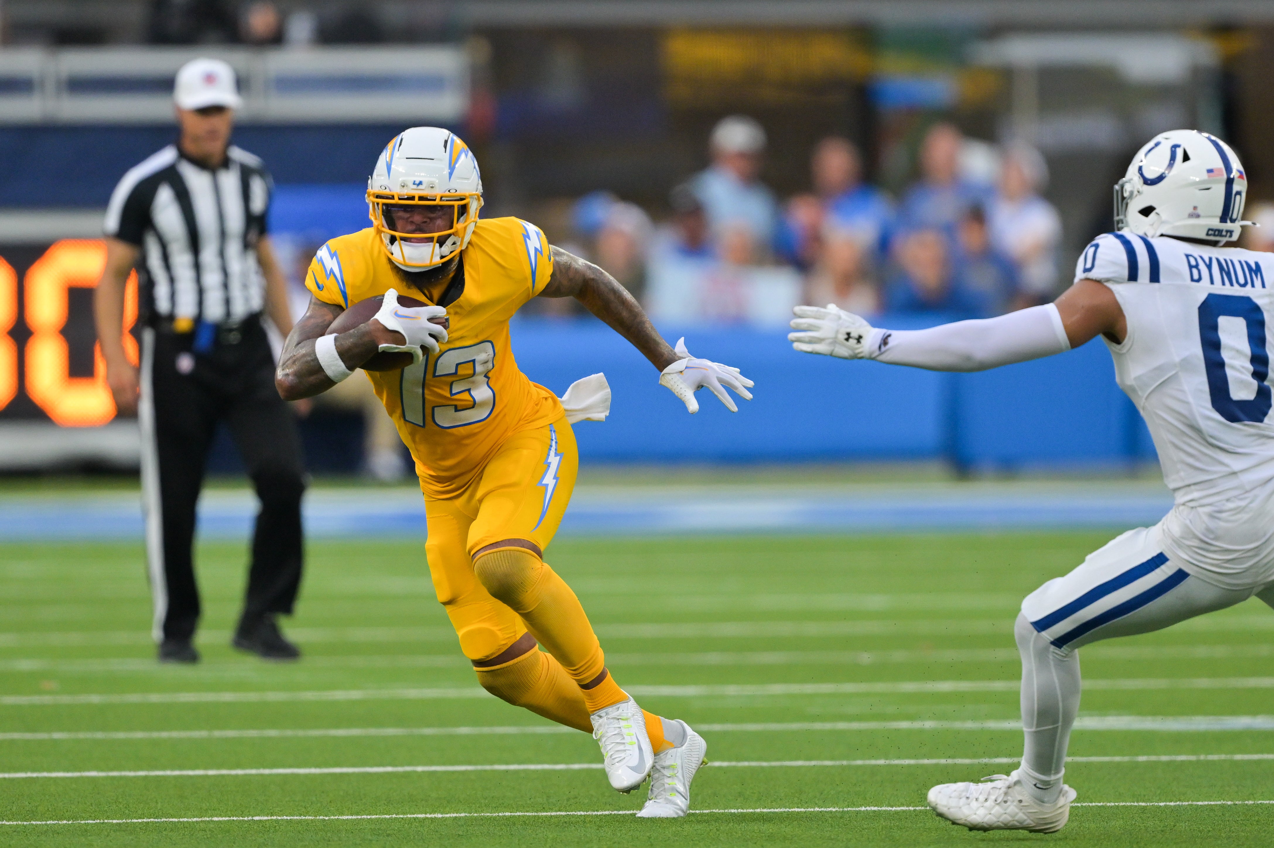Oct 19, 2025; Inglewood, California, USA; Los Angeles Chargers wide receiver Keenan Allen (13) runs the ball in the second half against the Indianapolis Colts at SoFi Stadium. Mandatory Credit: Jayne Kamin-Oncea-Imagn Images