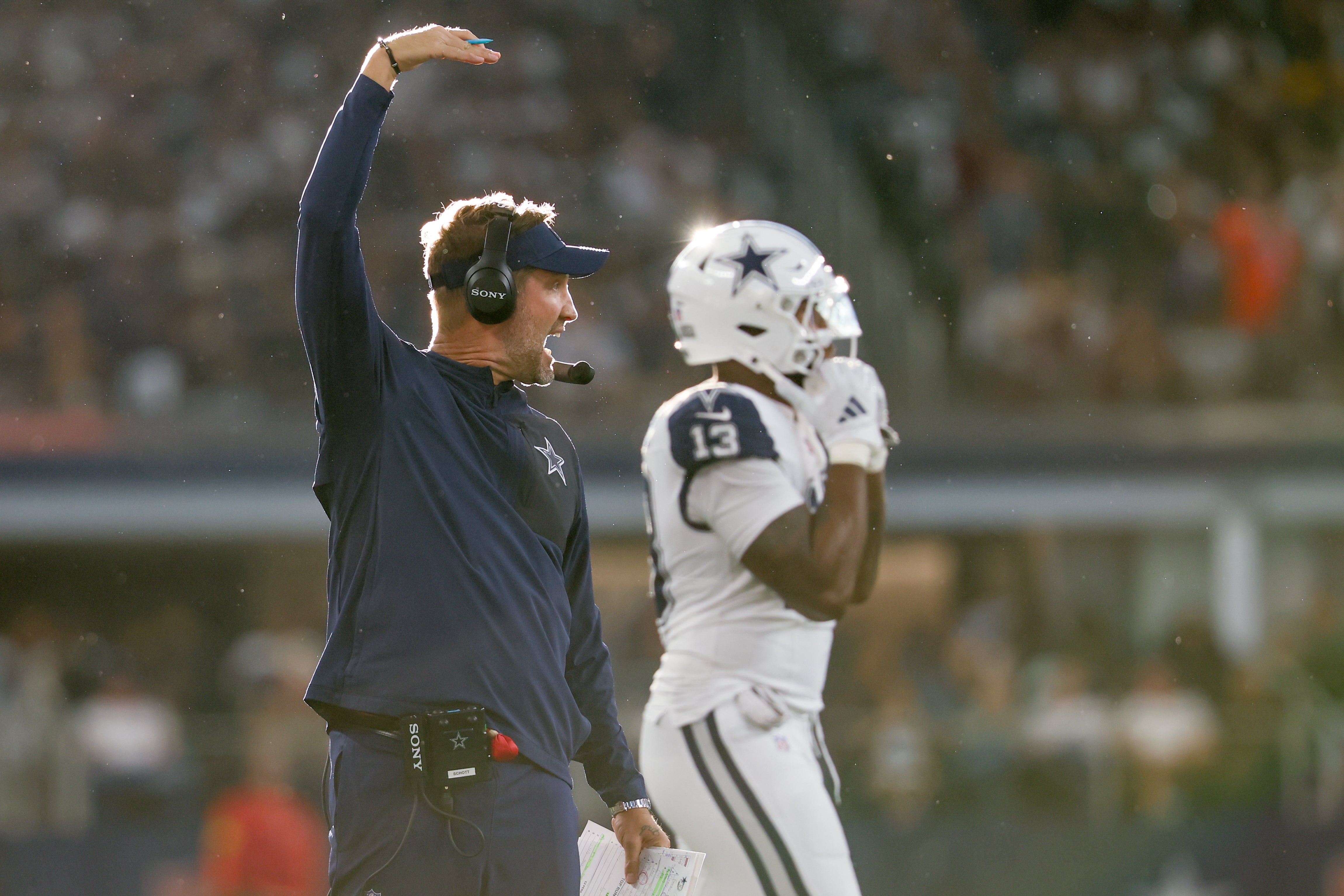 Oct 19, 2025; Arlington, Texas, USA; Dallas Cowboys head coach Brian Schottenheimer looks on during the third quarter of the game against the Washington Commanders at AT&T Stadium.