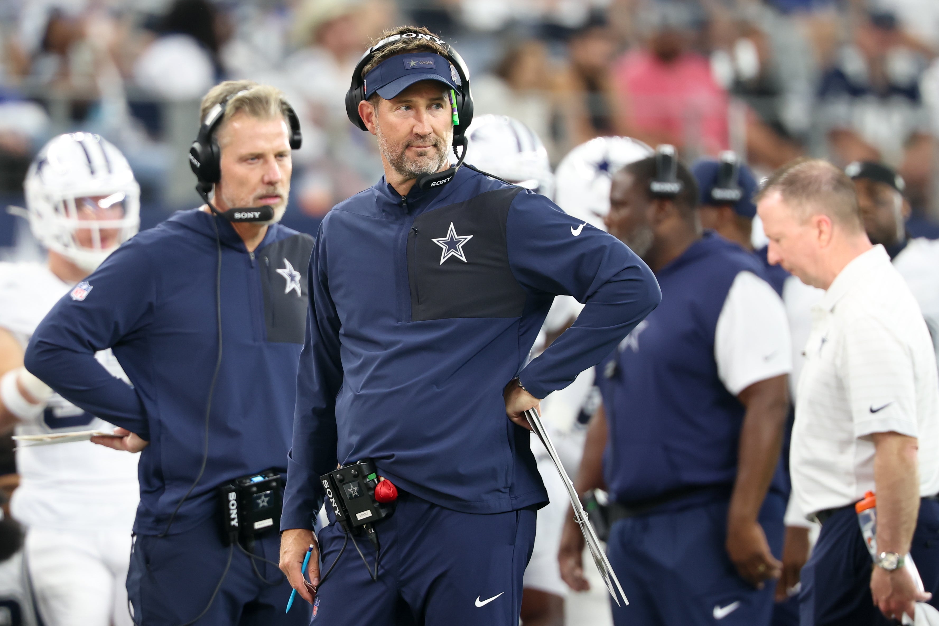 Dallas Cowboys head coach Brian Schottenheimer looks on during the third quarter of the game against the Washington Commanders at AT&T Stadium.