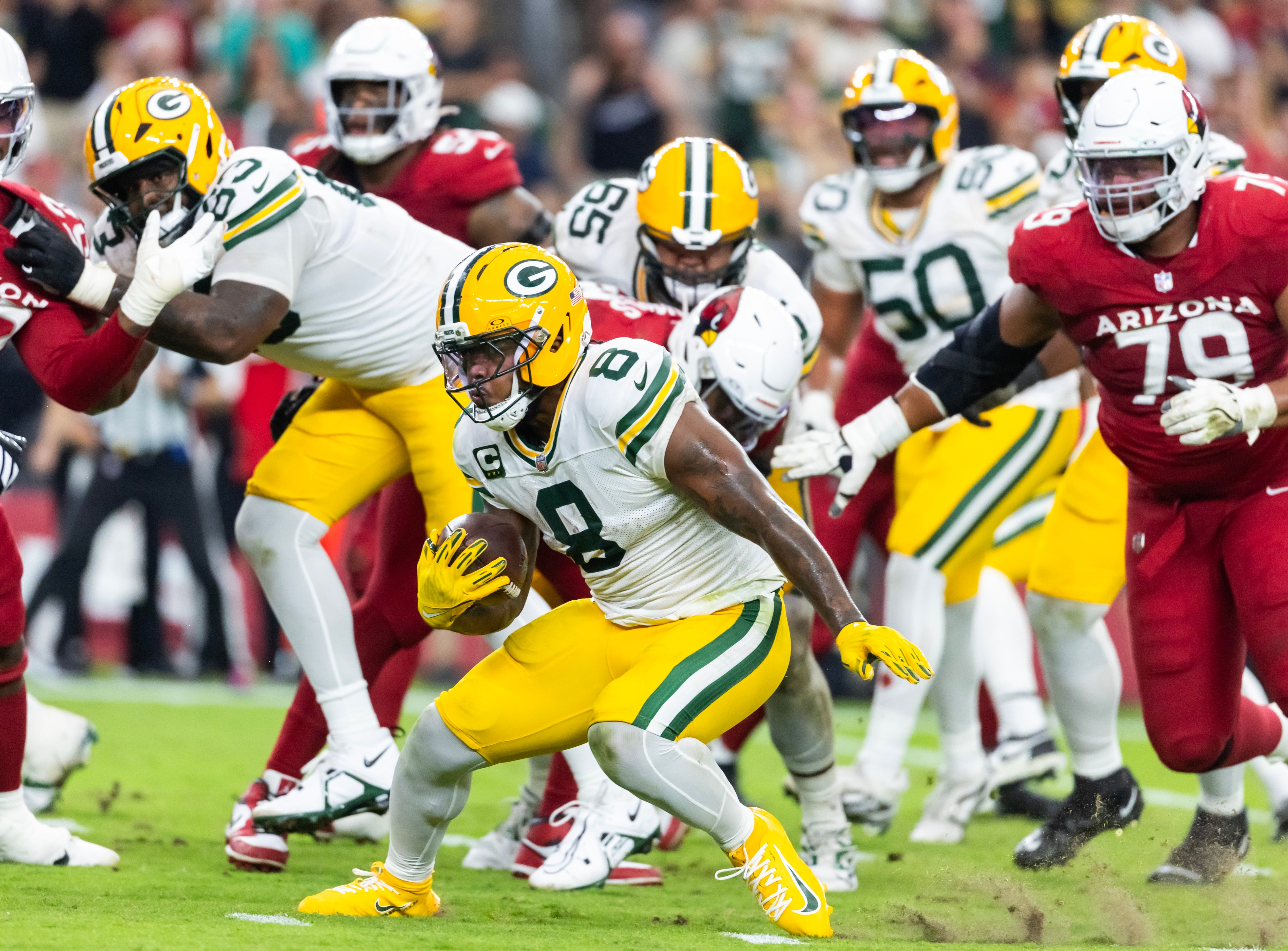 Oct 19, 2025; Glendale, Arizona, USA; Green Bay Packers running back Josh Jacobs (8) against the Arizona Cardinals in the second half at State Farm Stadium.