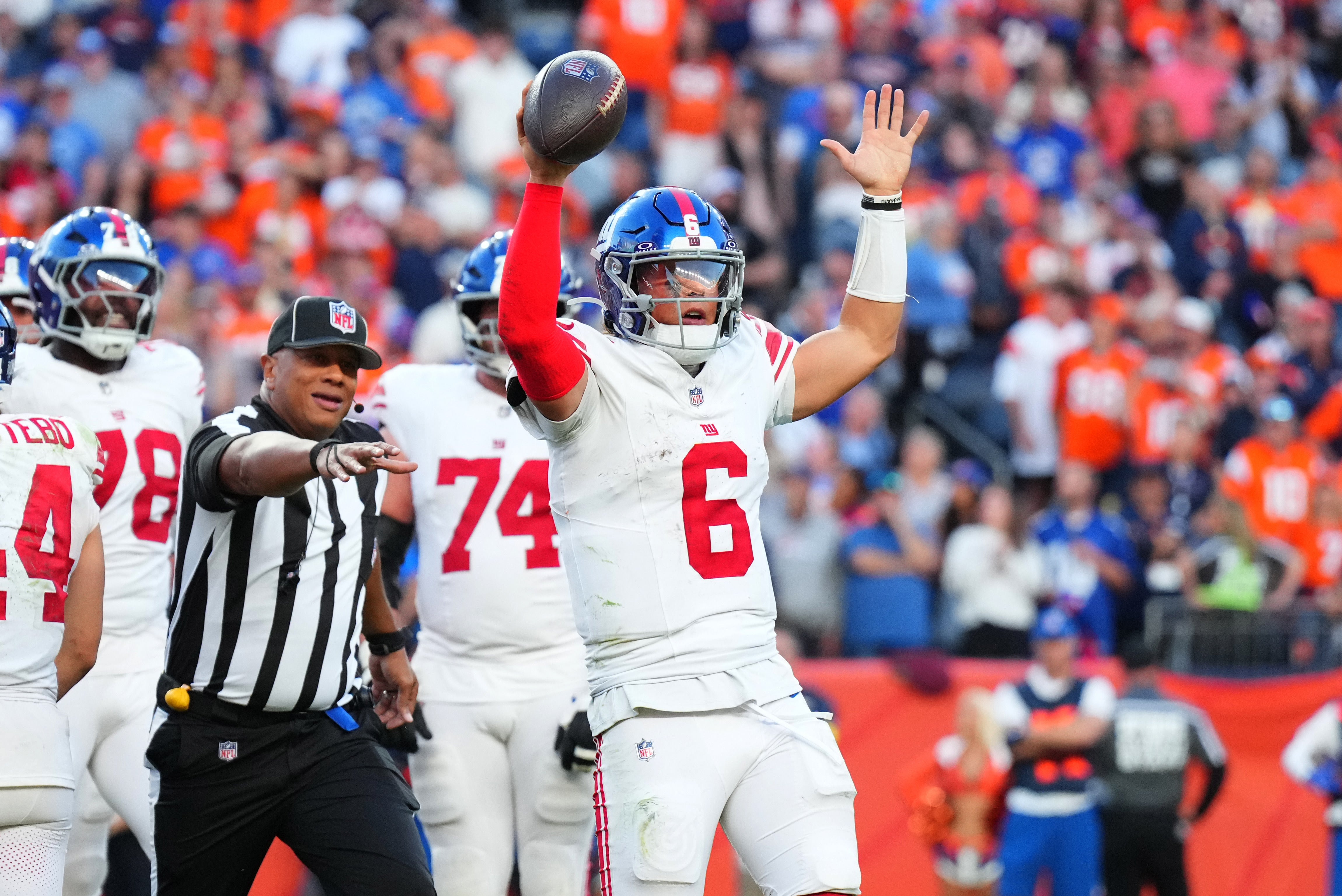 Oct 19, 2025; Denver, Colorado, USA; New York Giants quarterback Jaxson Dart (6) reacts after a play against the Denver Broncos at Empower Field at Mile High.