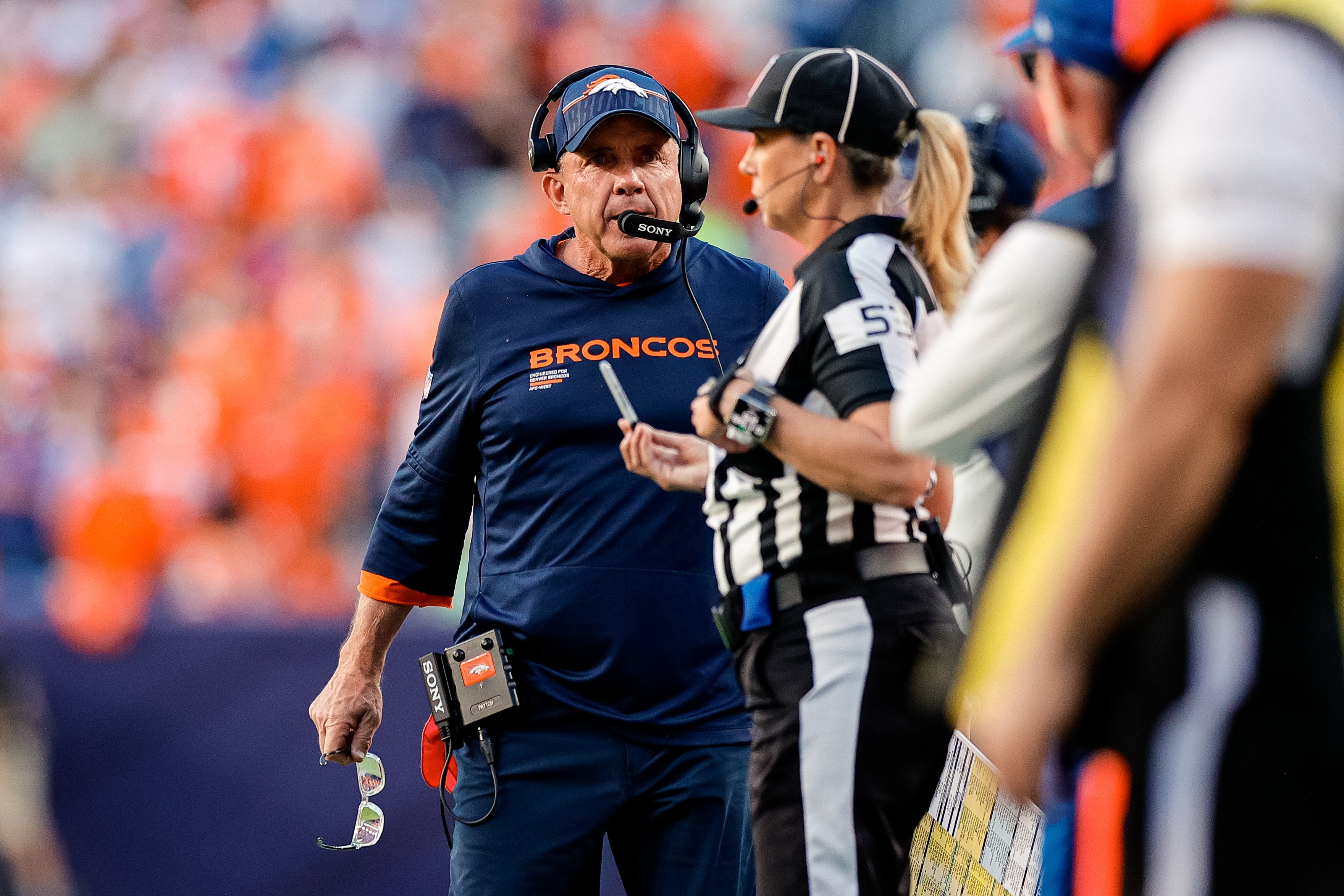 Oct 19, 2025; Denver, Colorado, USA; Denver Broncos head coach Sean Payton looks to down judge Sarah Thomas (53) in the fourth quarter against the New York Giants at Empower Field at Mile High.