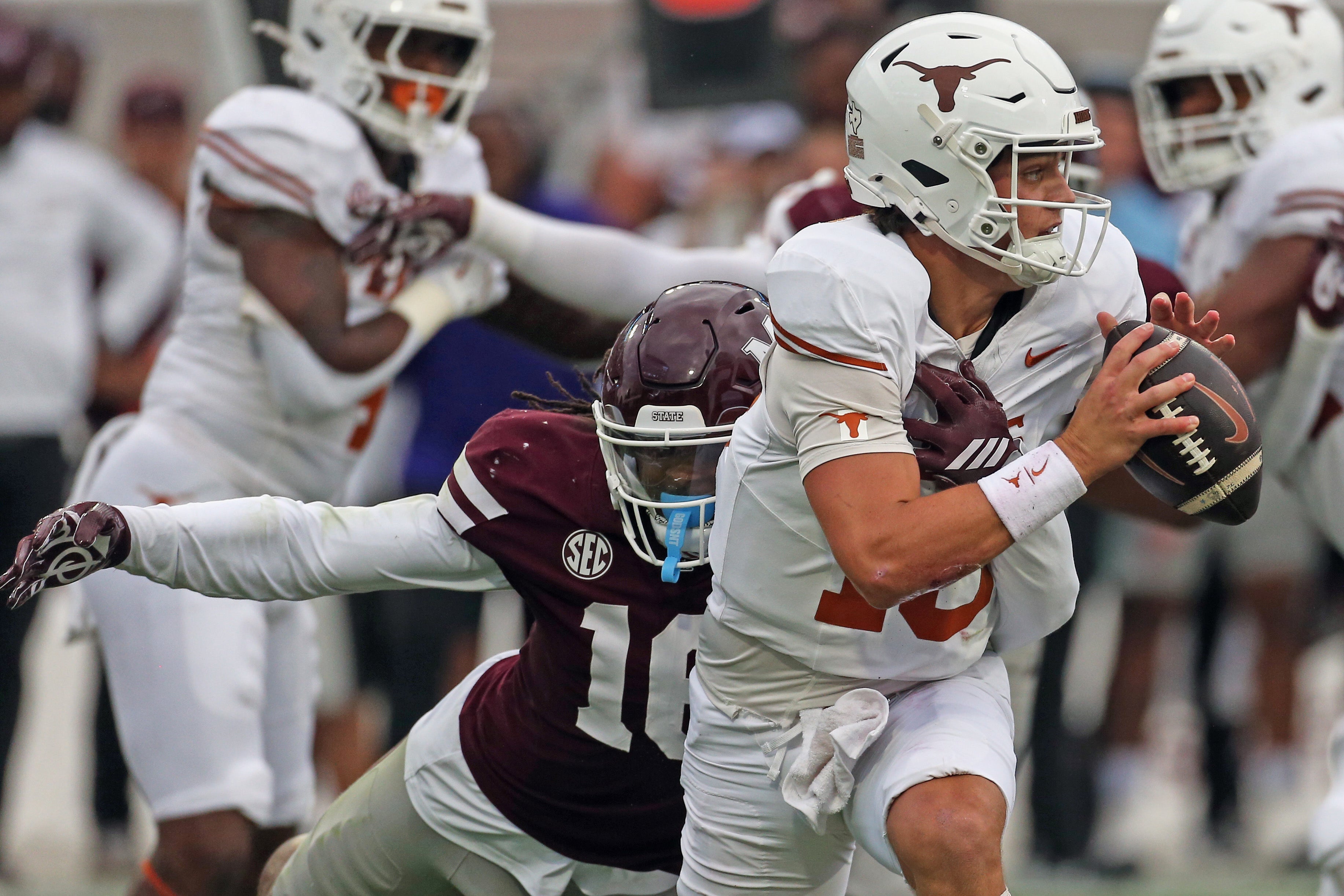 Oct 25, 2025; Starkville, Mississippi, USA; Mississippi State Bulldogs linebacker Derion Gullette (16) sacks Texas Longhorns quarterback Arch Manning (16) during the first quarter at Davis Wade Stadium at Scott Field. Mandatory Credit: Petre Thomas-Imagn Images