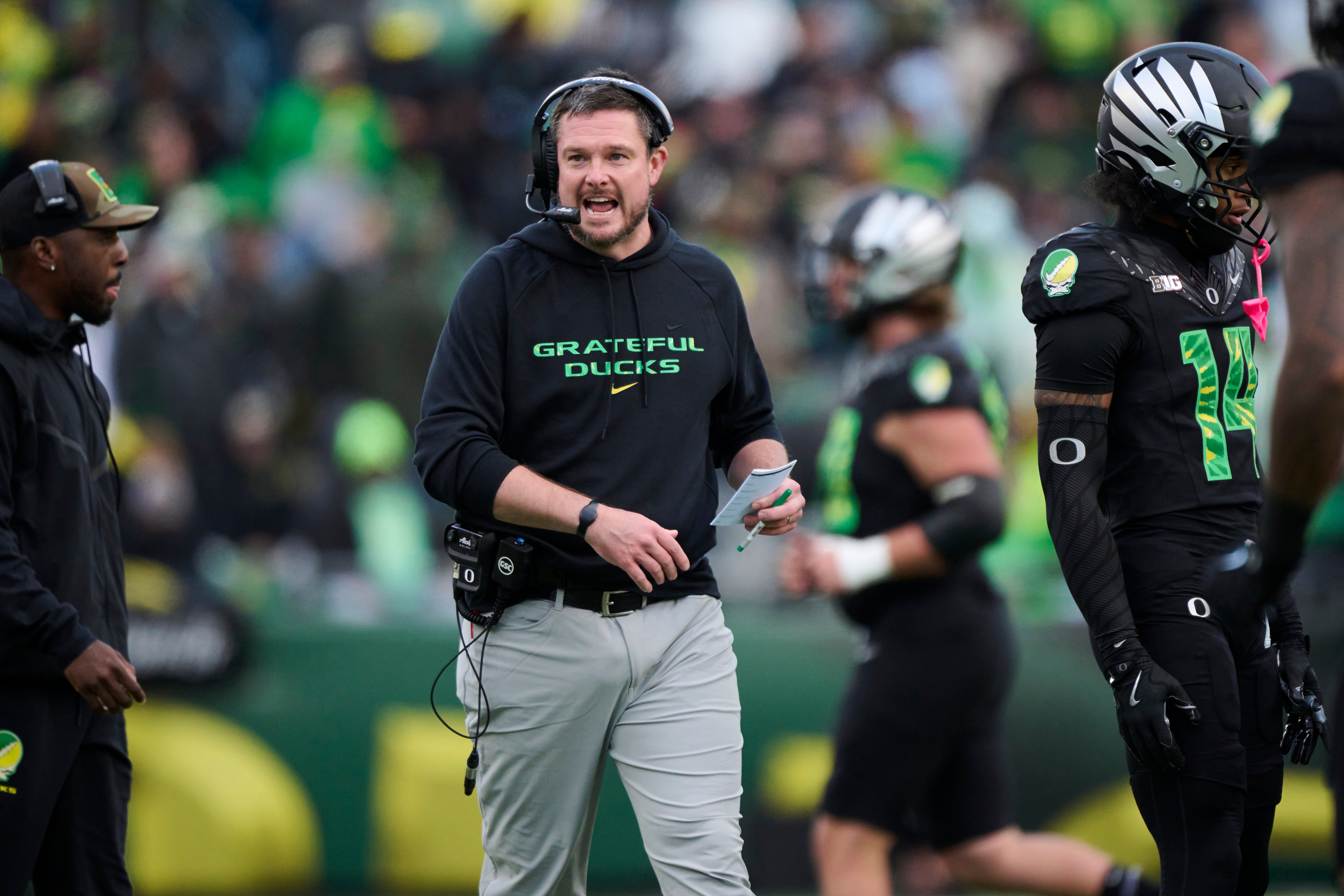 Oct 25, 2025; Eugene, Oregon, USA; Oregon Ducks head coach Dan Lanning instructs players during the first half against the Wisconsin Badgers at Autzen Stadium. Mandatory Credit: Troy Wayrynen-Imagn Images