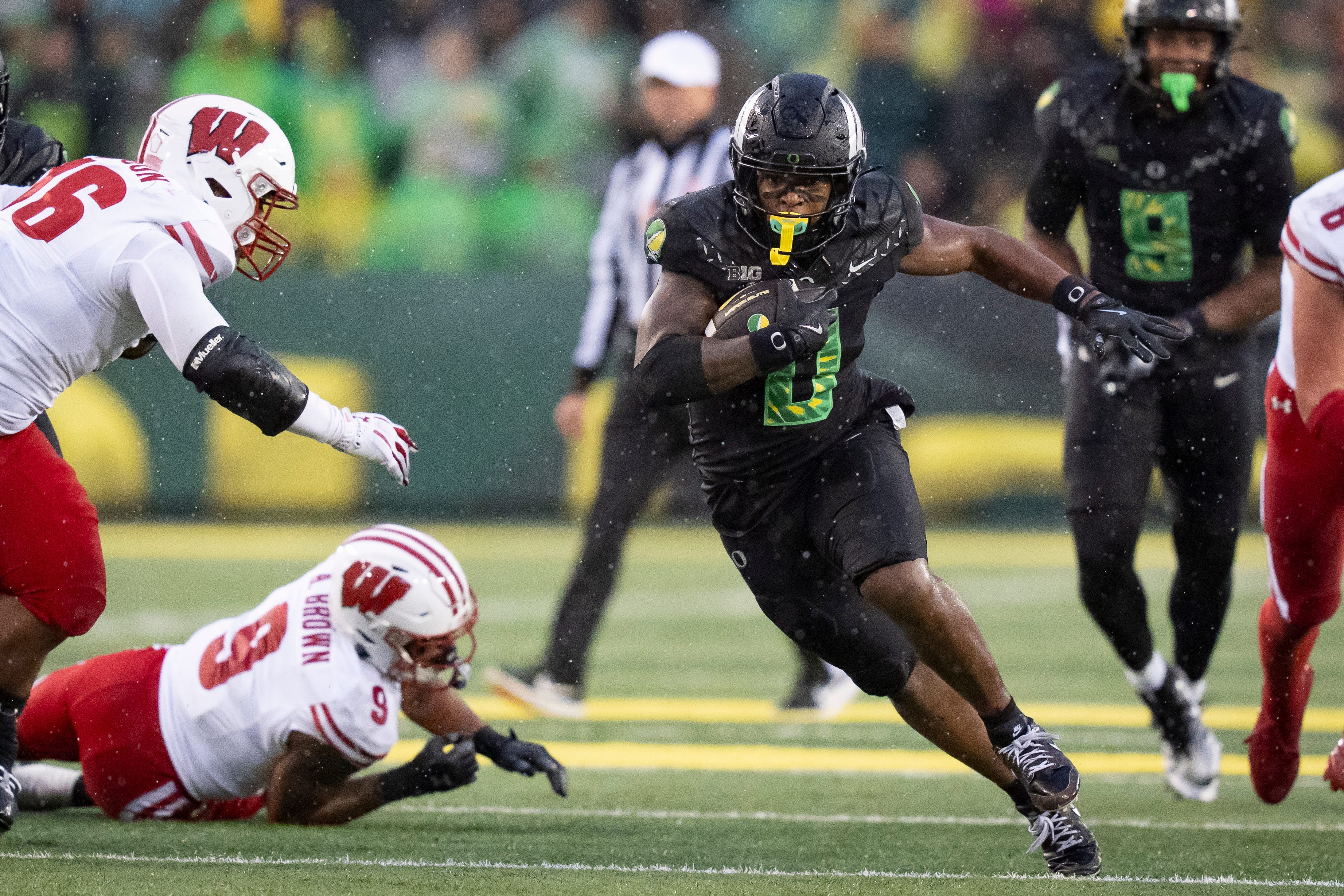 Oregon running back Jordon Davison carries the ball as the Oregon Ducks host the Wisconsin Badgers on Oct. 25, 2025, at Autzen Stadium in Eugene, Oregon.