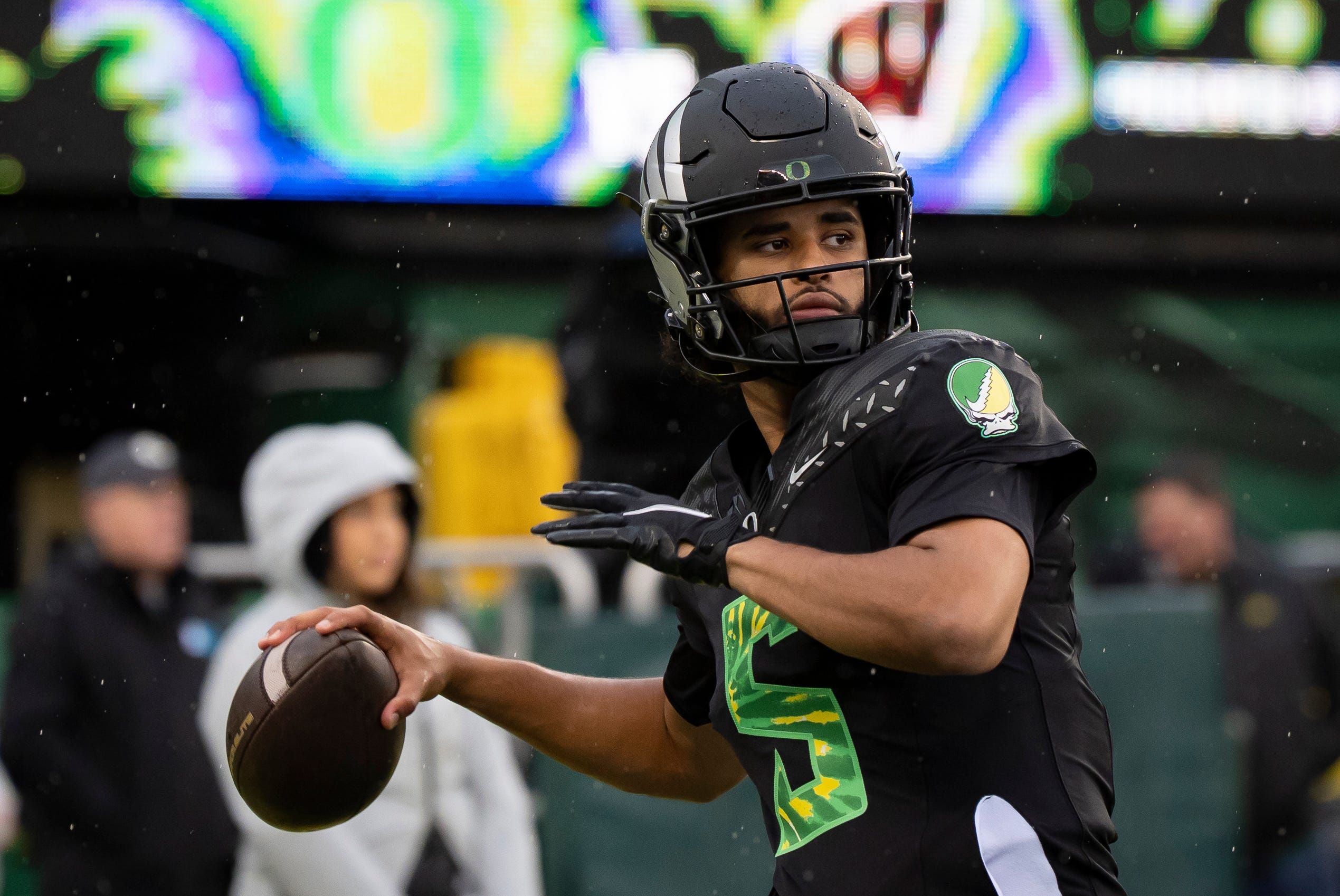Oregon quarterback Dante Moore throws a pass before the game as the Oregon Ducks host the Wisconsin Badgers on Oct. 25, 2025, at Autzen Stadium in Eugene, Oregon.