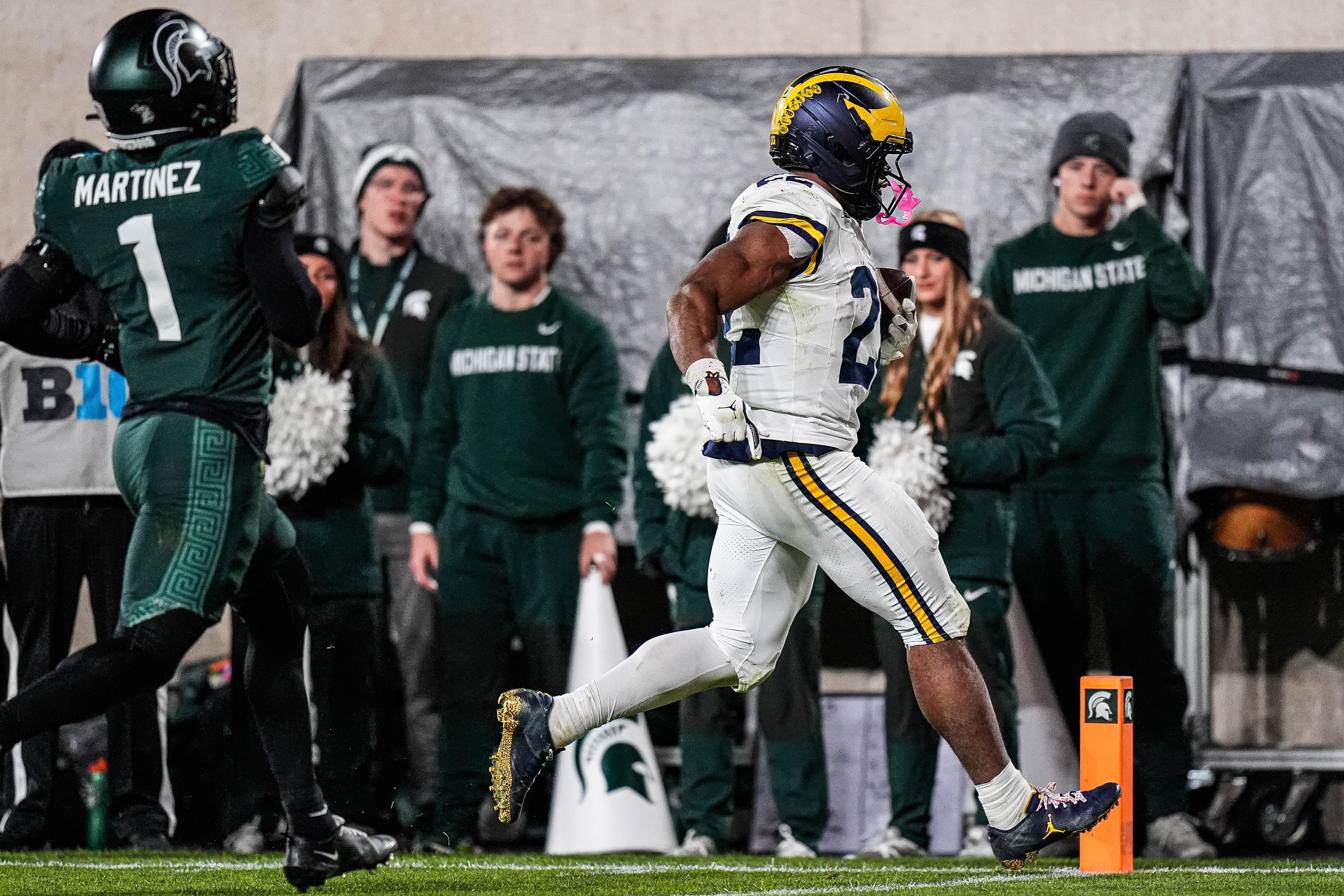 Michigan running back Justice Haynes (22) runs for a touchdown against Michigan State during the second half at Spartan Stadium in East Lansing on Saturday, October 25, 2025.